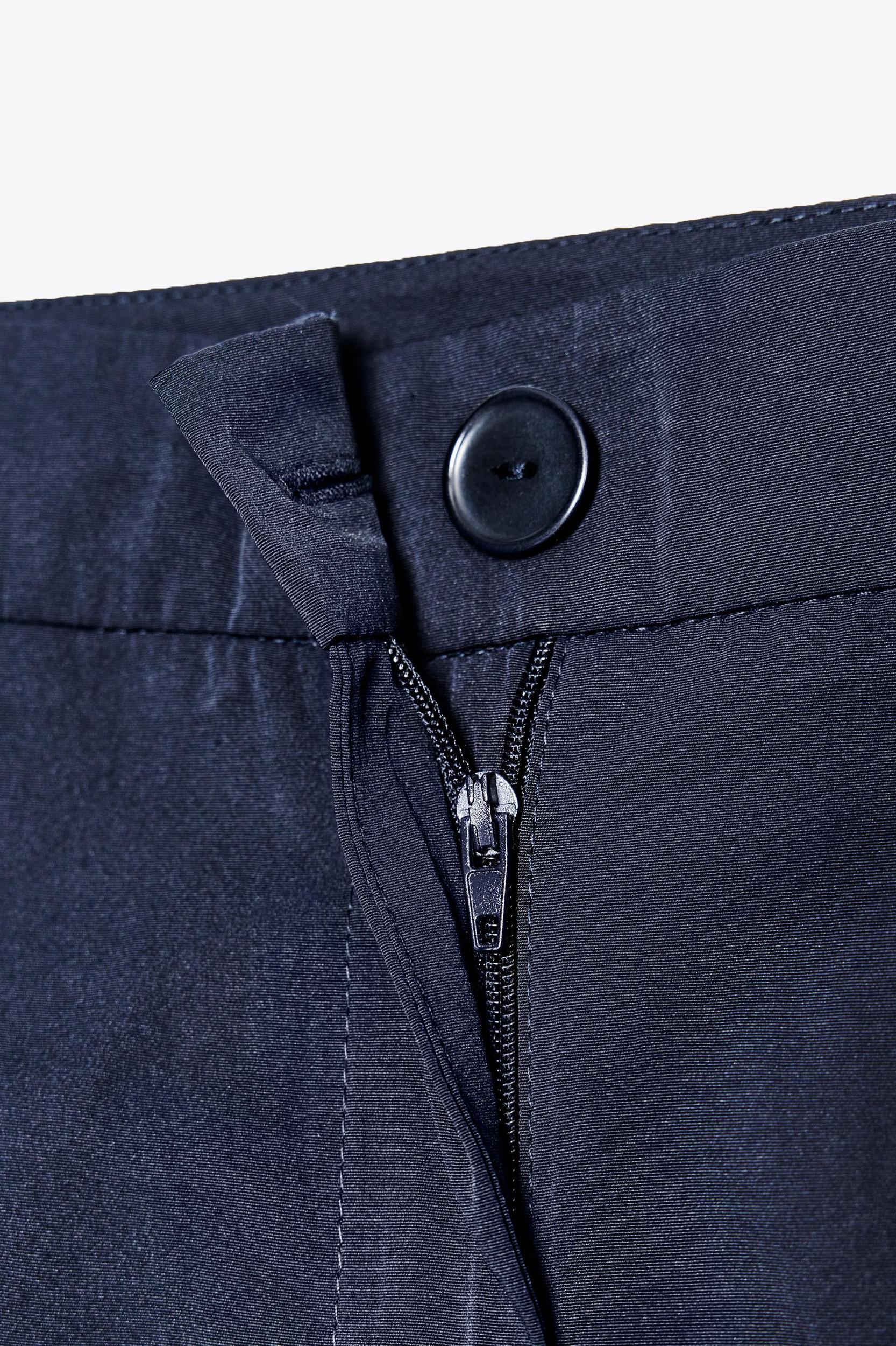 LONG PLEATED SHORTS Product Image