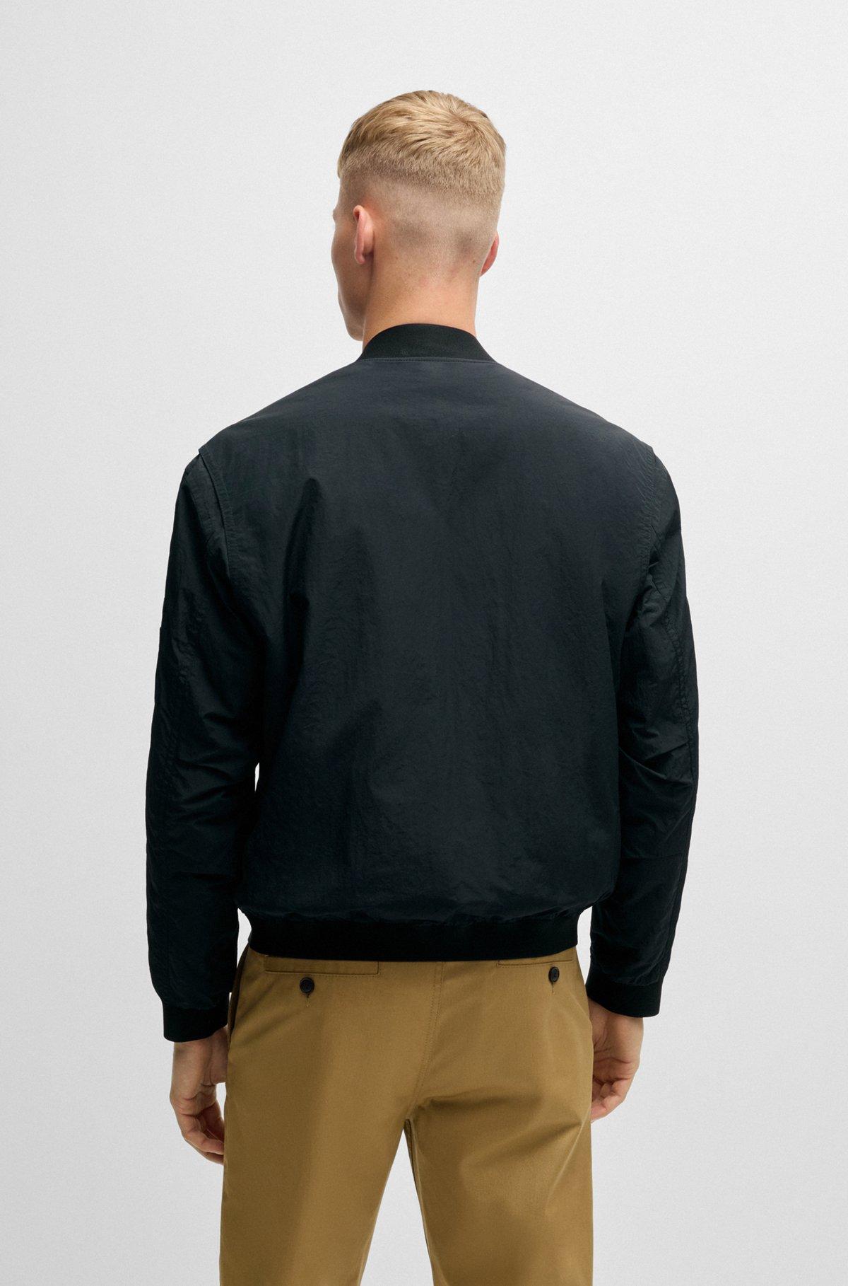 Water-repellent bomber jacket with logo badge Product Image