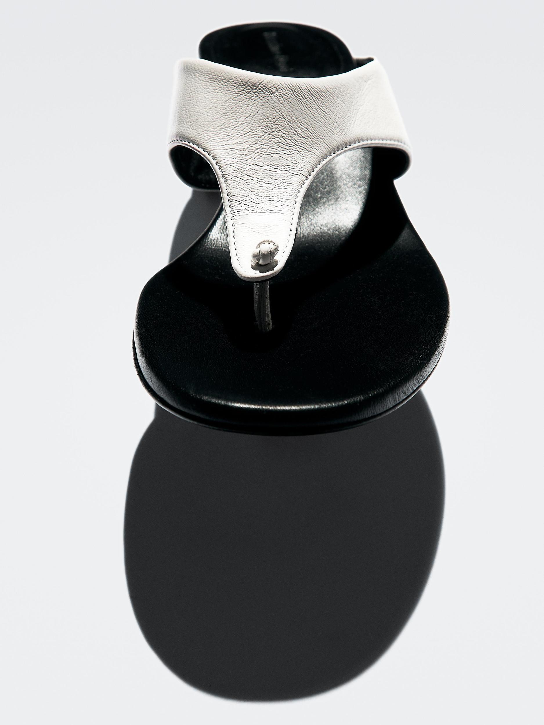 Heeled sandals with toe divider Product Image