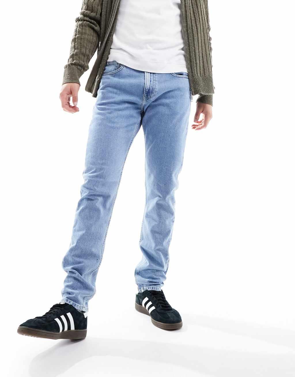 Calvin Klein Jeans slim tapered jeans in light wash Product Image