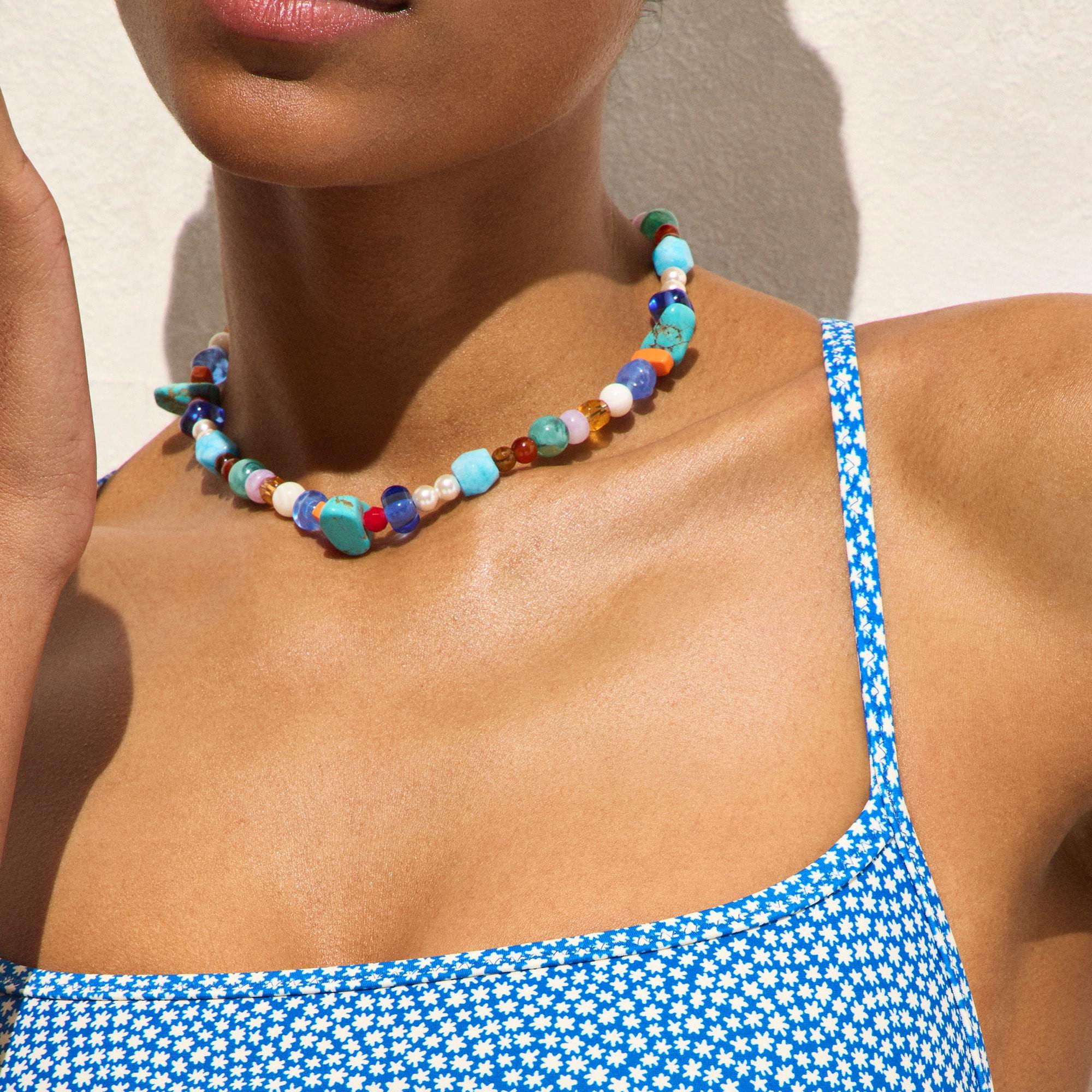 Scoopback one-piece swimsuit in floral-stripe print Product Image