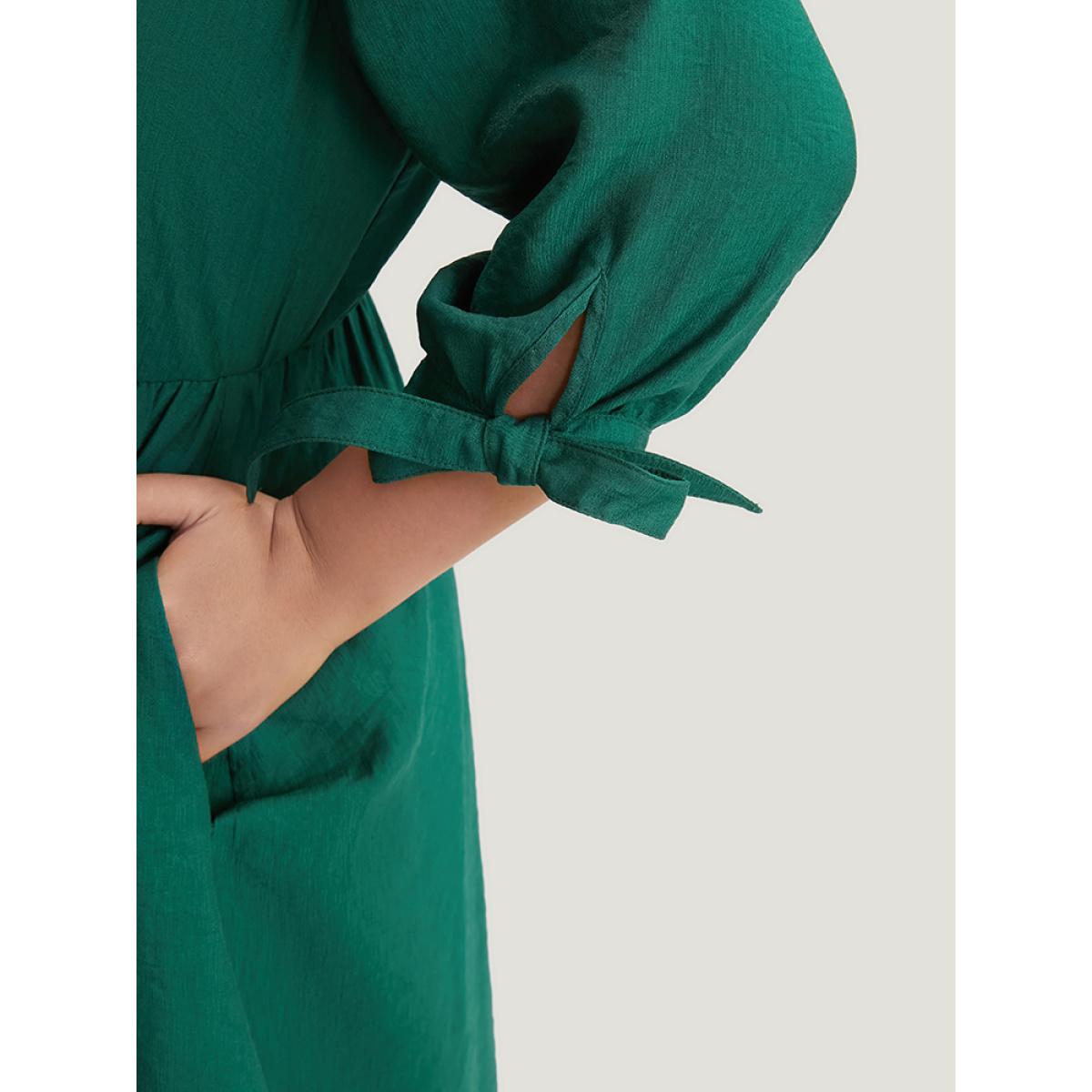 Plus Size Solid Pocket Knot Sleeve Half Zipper Arc Hem Dress DarkGreen Women Office Cross straps V-neck Elbow-length sleeve Curvy Midi Dress BloomChic 28/5X Product Image