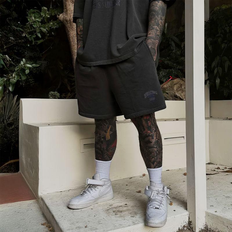 Elbow-Sleeve Crew Neck Lettering Print T-Shirt / Drawstring Waist Wide Leg Sweat Shorts Product Image