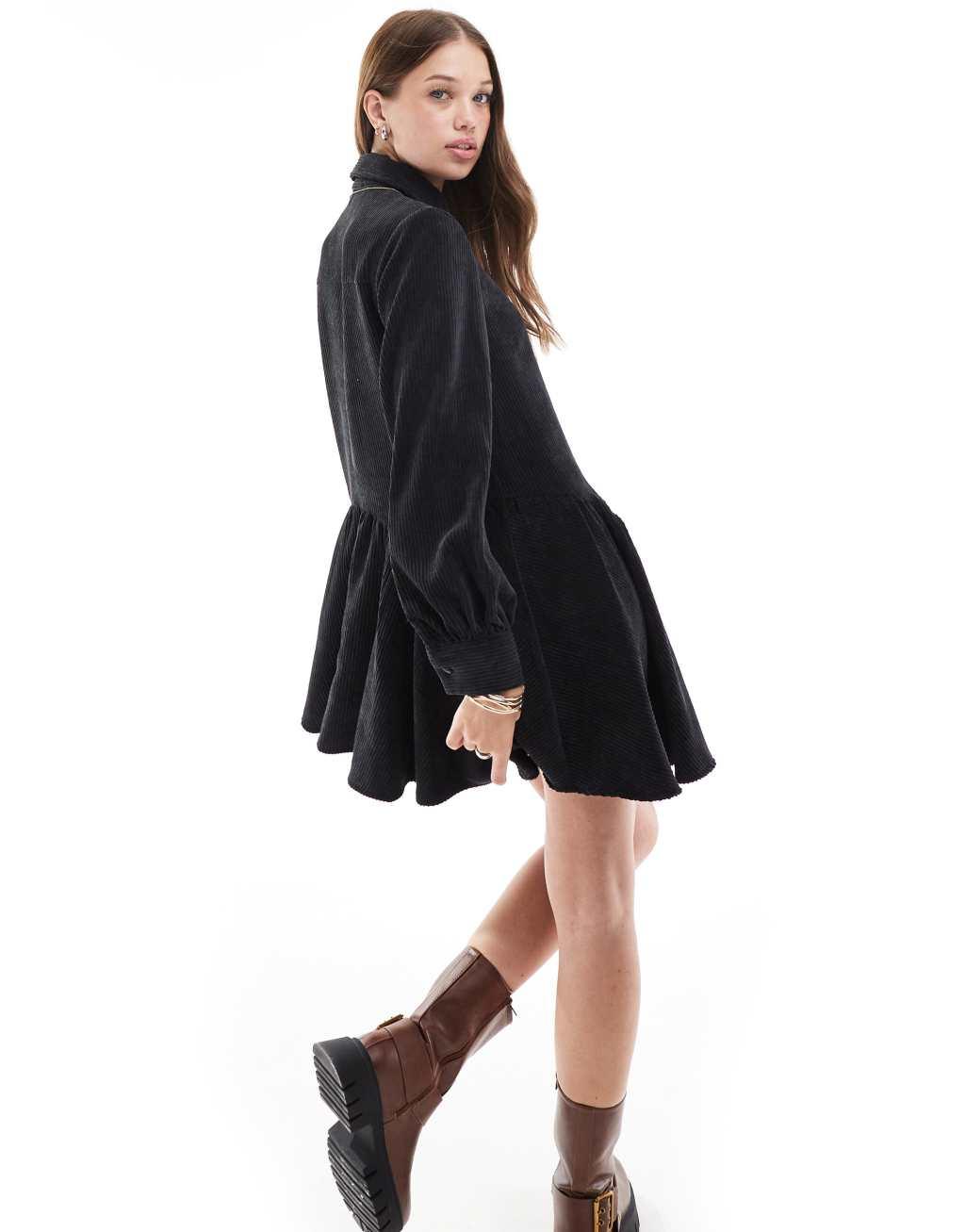 ASOS DESIGN corduroy mini smock dress with peplum hem in black Product Image