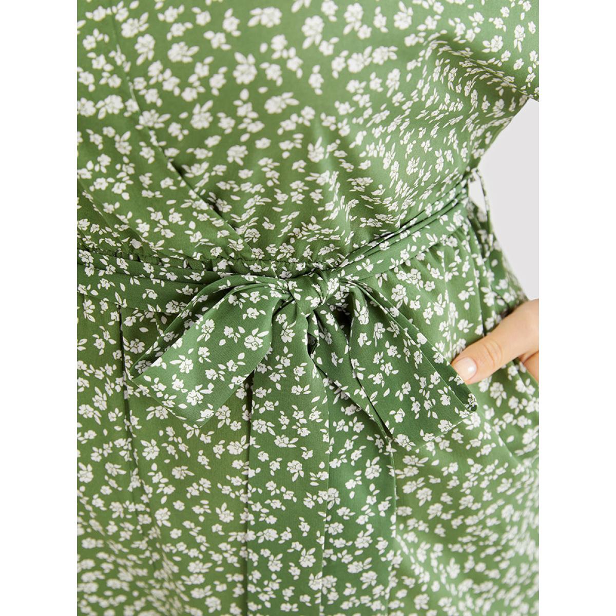 Plus Size Green Ditsy Floral Wrap Pocket Belt Batwing Sleeve Jumpsuit Women Elegant Half Sleeve V-neck Dailywear Loose Jumpsuits BloomChic 22-24/3X Product Image