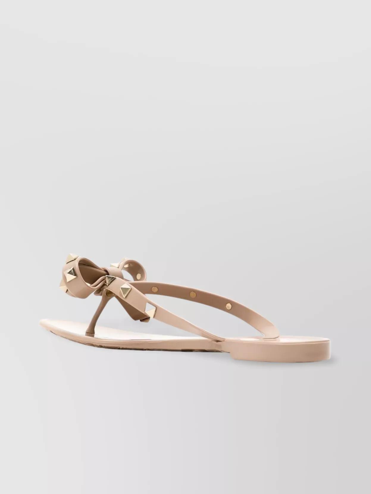 VALENTINO GARAVANI Women Rockstud Rubber Flip Flops In Beige Product Image