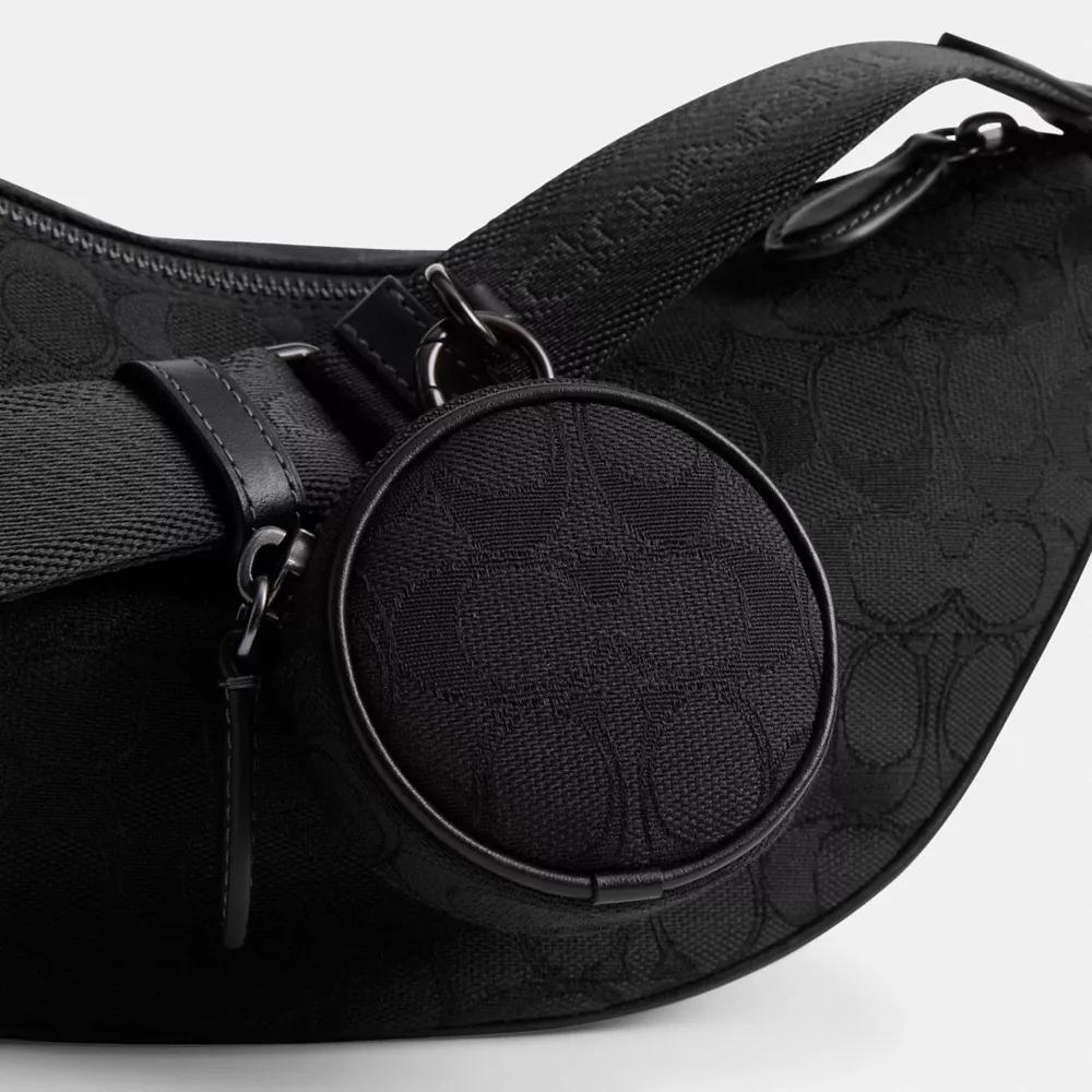 Hall Soft Sling Bag In Signature Jacquard Product Image