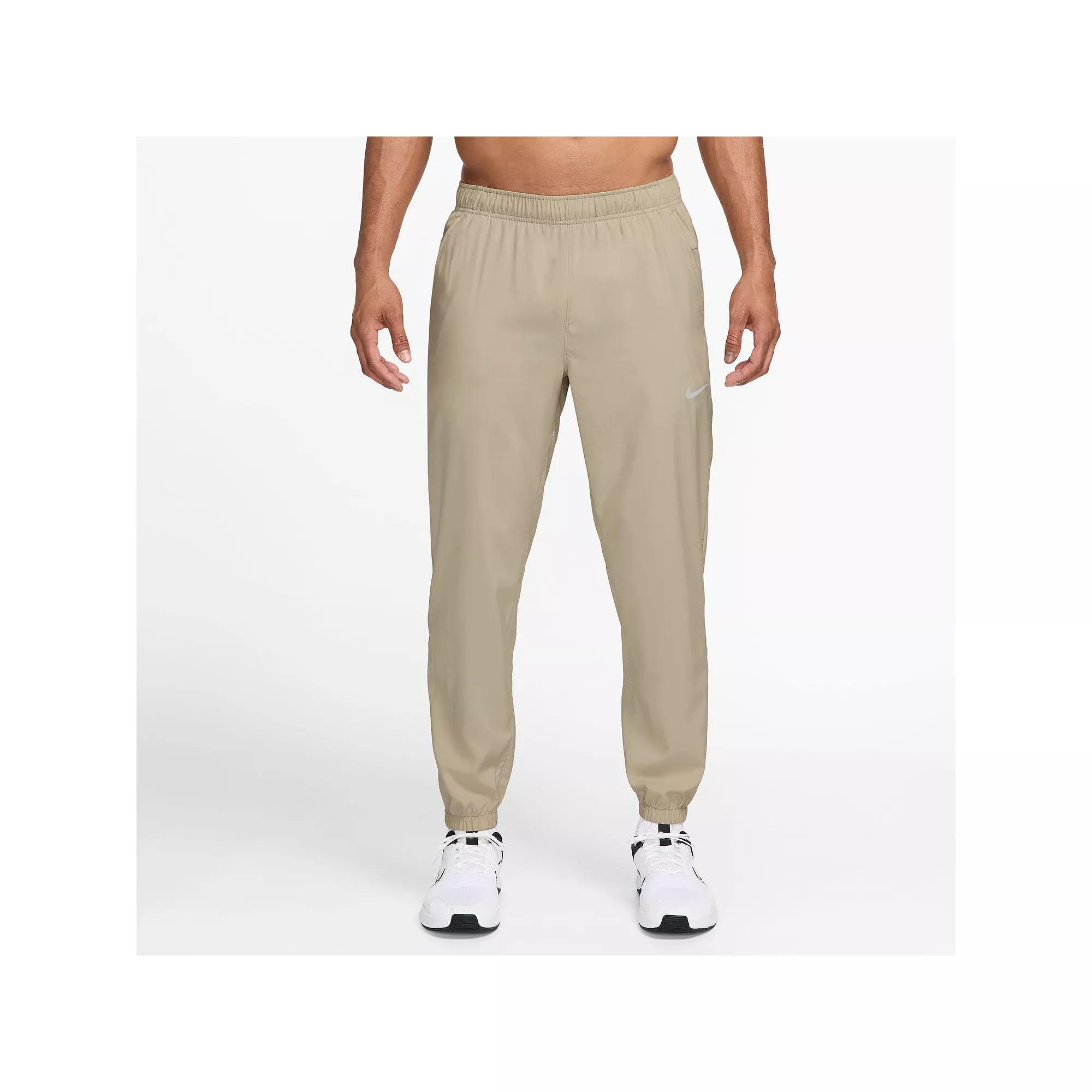 Men's Nike Form Dri-FIT Tapered Versatile Pants, Size: Large, Desert Green Product Image