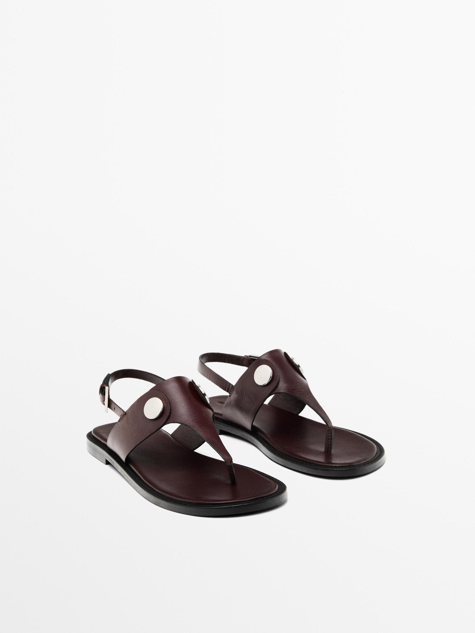 Flat sandals with buttons Product Image