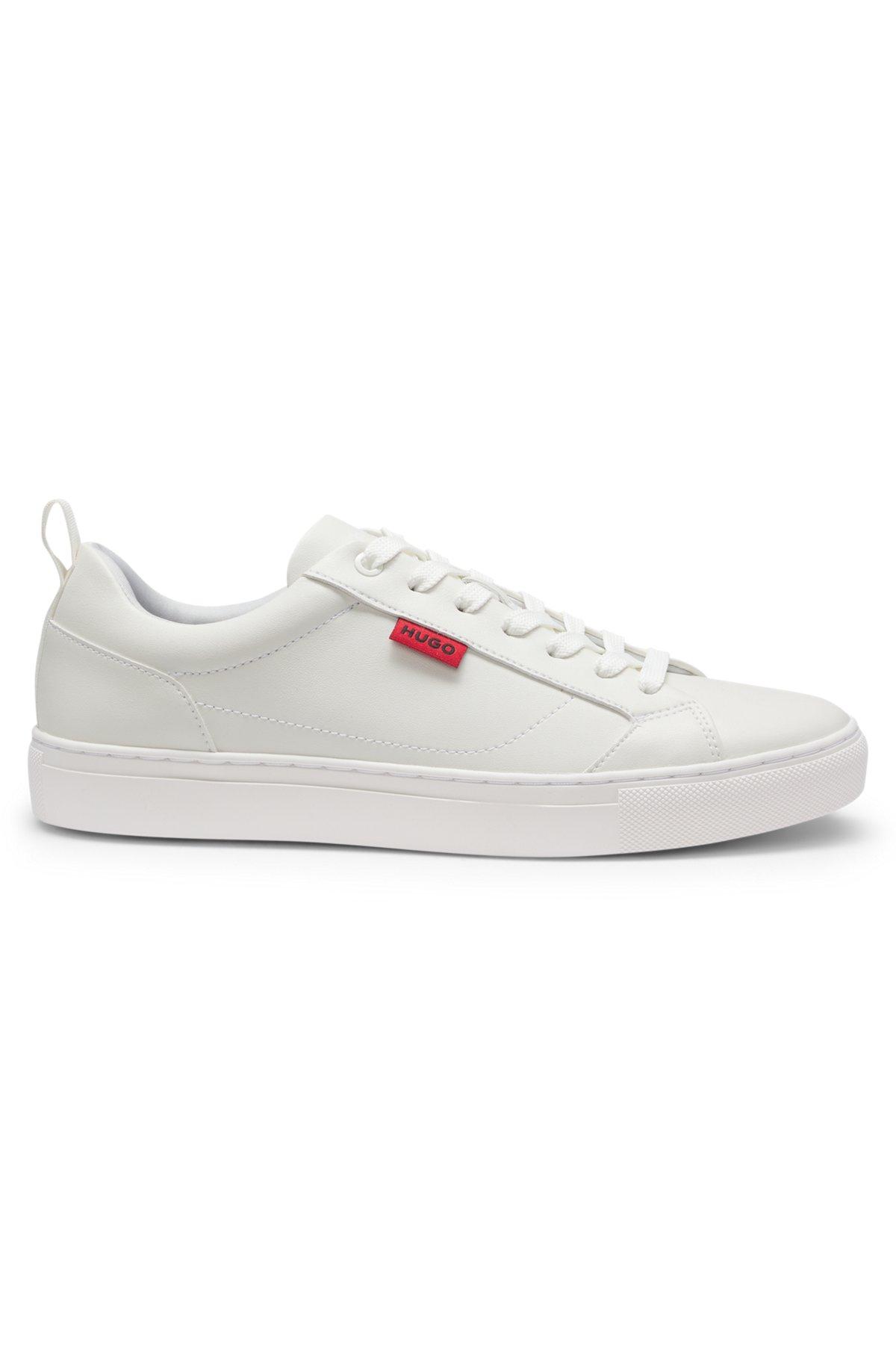 Faux-leather trainers with red logo flag Product Image