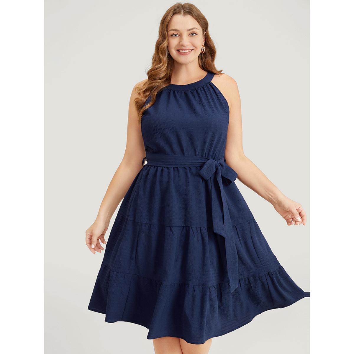 Plus Size Solid Knot Halter Pocket Belted Ruffles Tiered Hem Dress Indigo Women Elegant Gathered Halter neck Sleeveless Curvy Knee Dress BloomChic 12/L Product Image