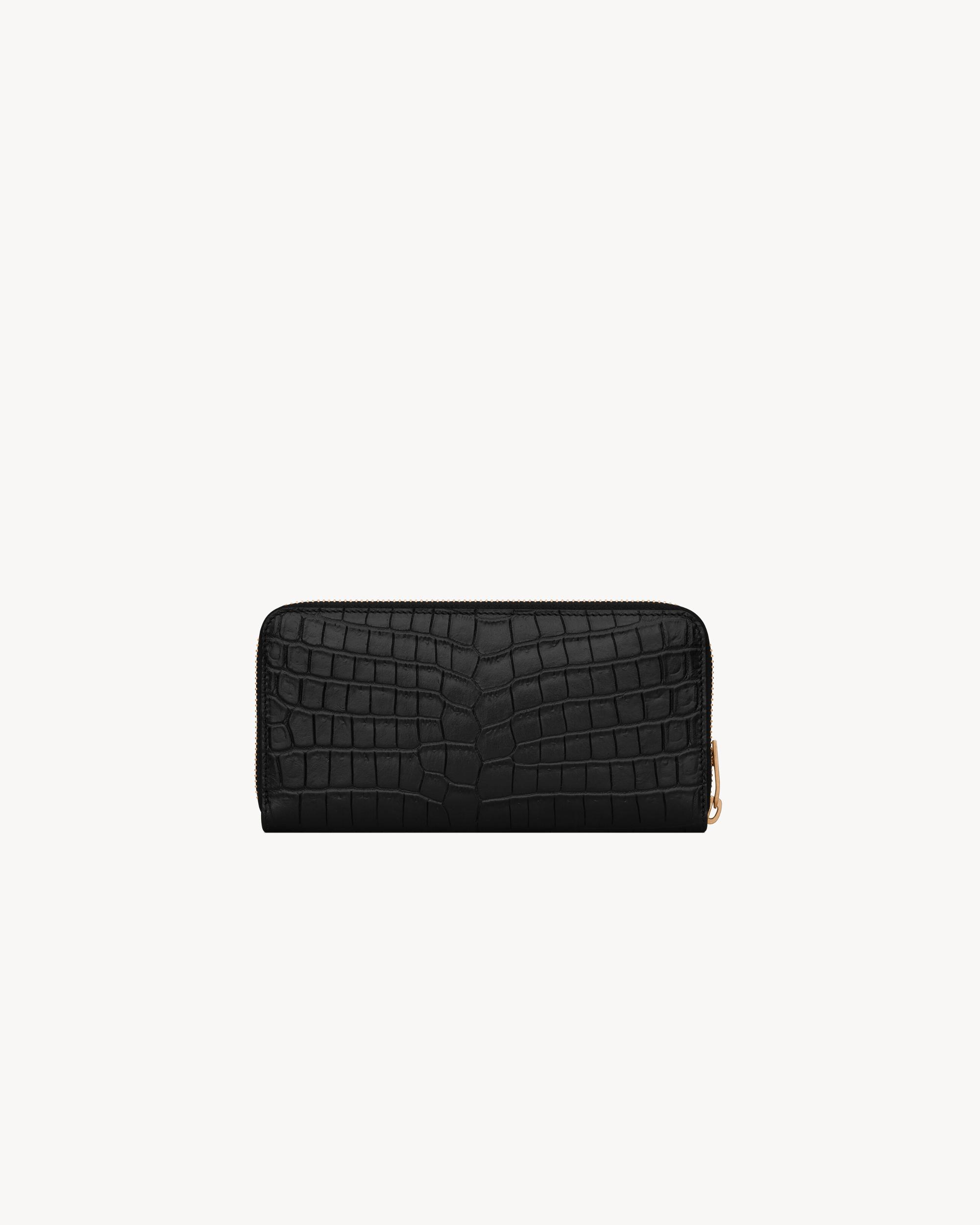 TINY CASSANDRE zip-around wallet in crocodile-embossed matte leather Product Image