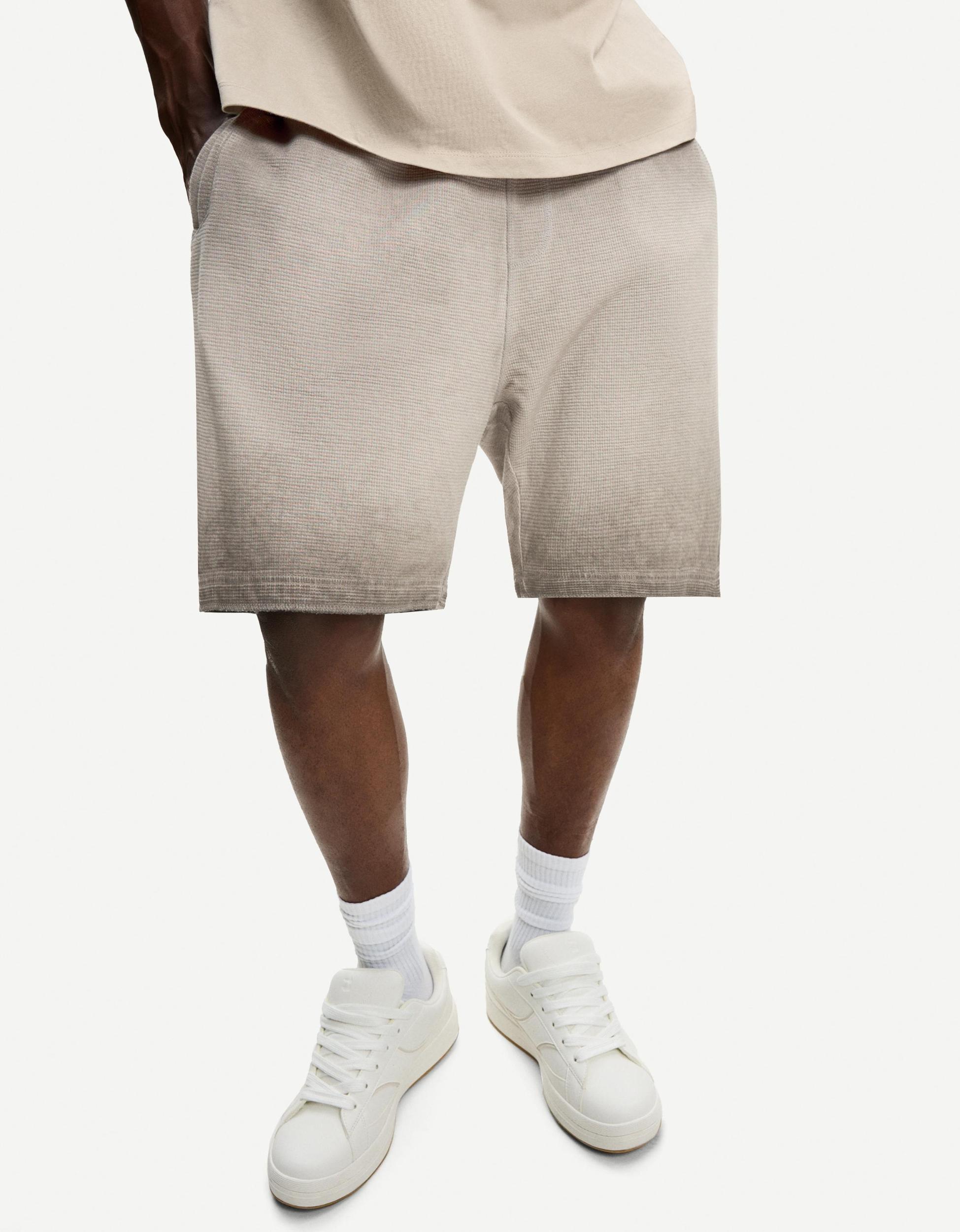 Faded waffle-knit Bermuda shorts Product Image
