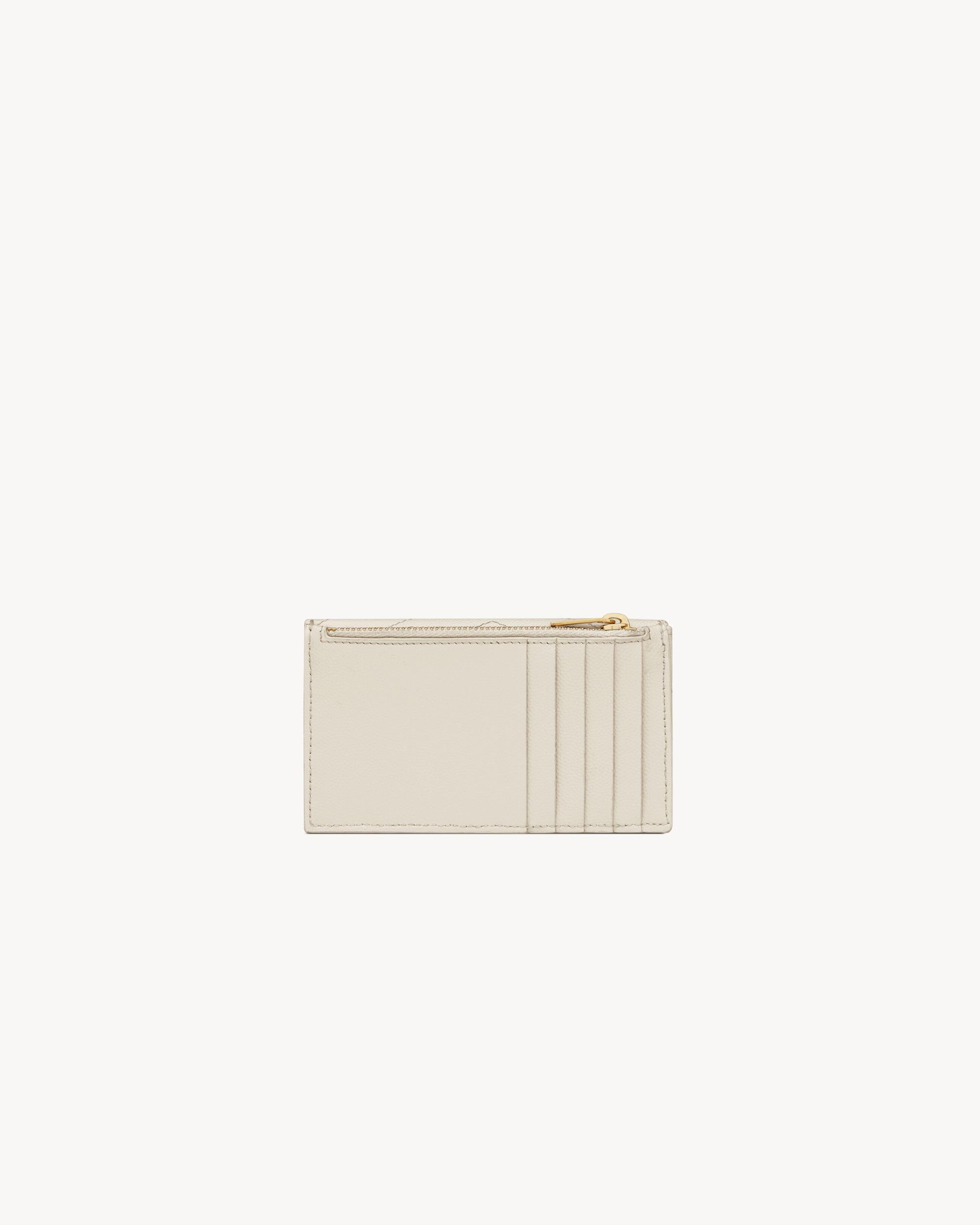 CASSANDRE MATELASSÉ compact tri fold wallet in grain de poudre leather Product Image