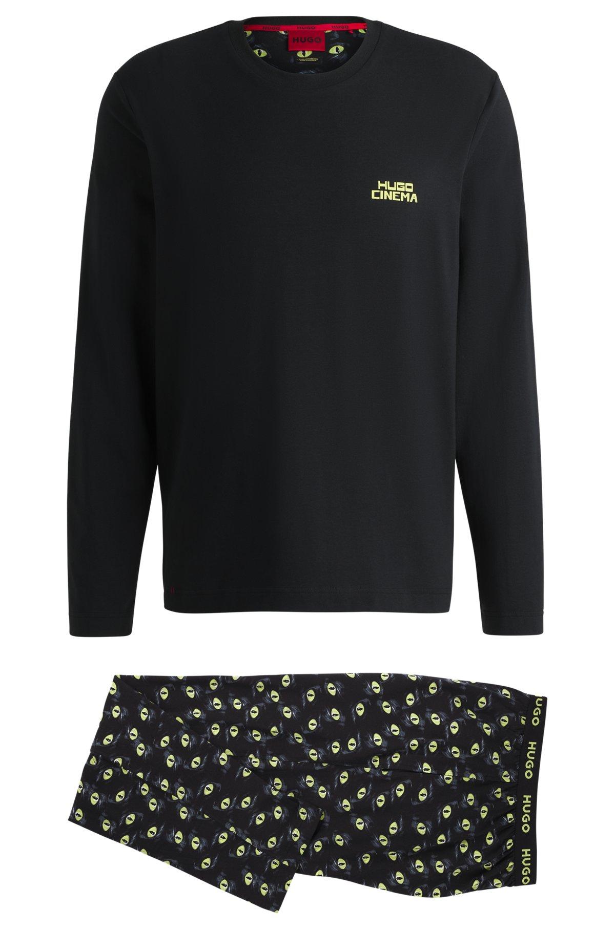 Stretch-cotton pajamas with 70s film graphics Product Image