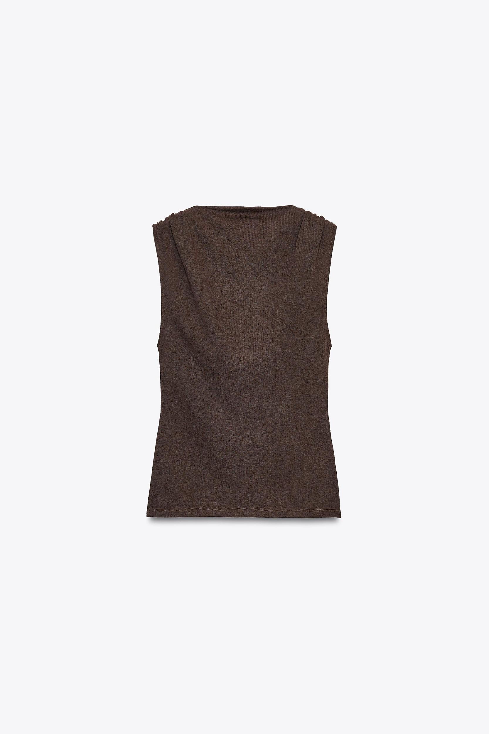 CUT-OUT KNIT TOP Product Image