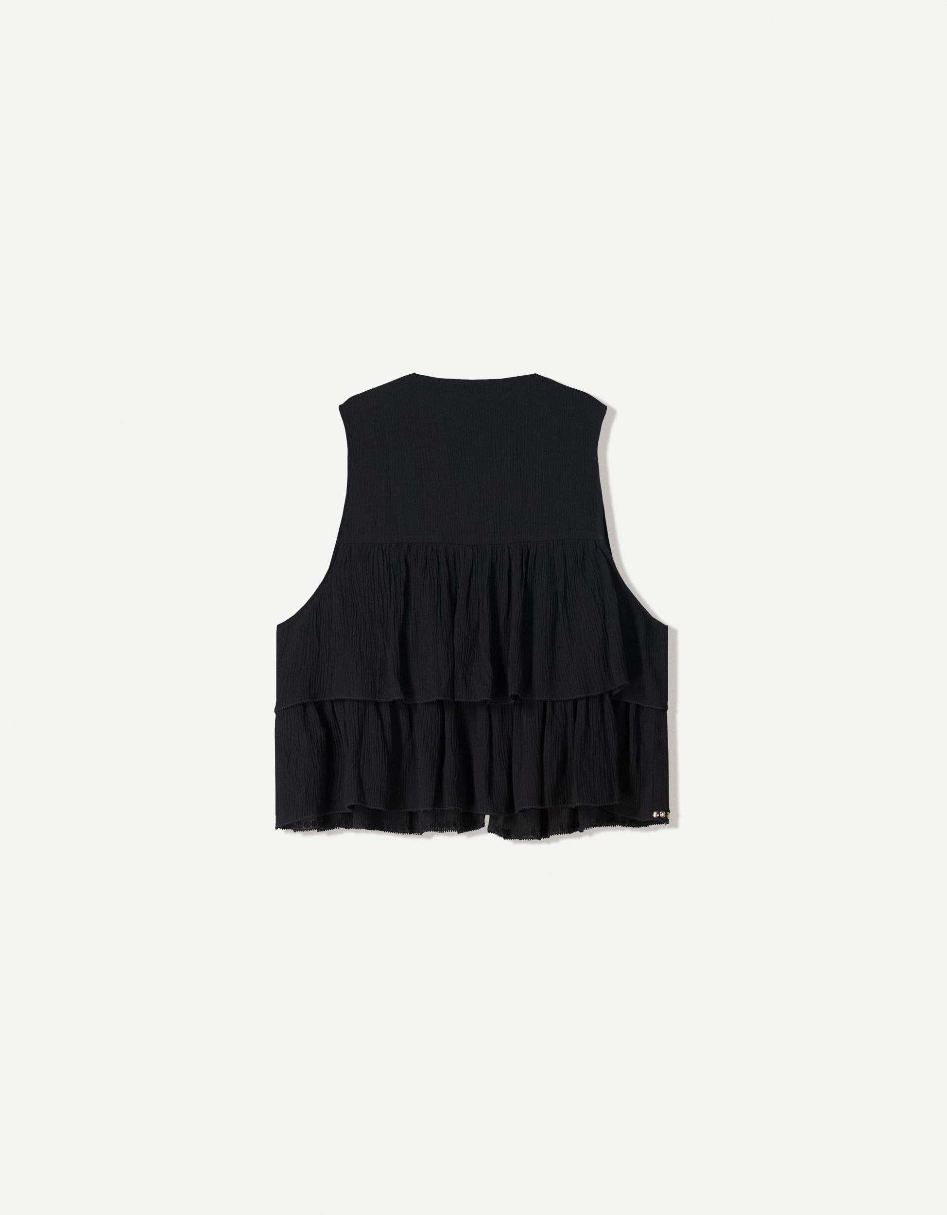 Studded vest with ruffles Product Image