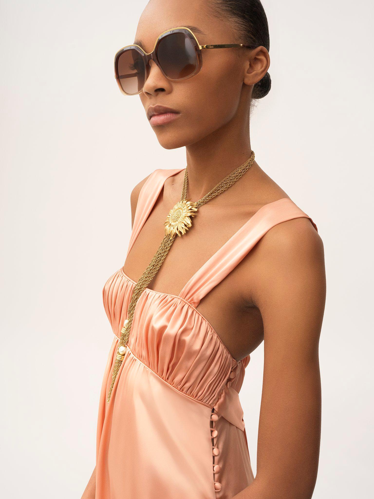 Sleeveless ruched long dress in silk satin Product Image