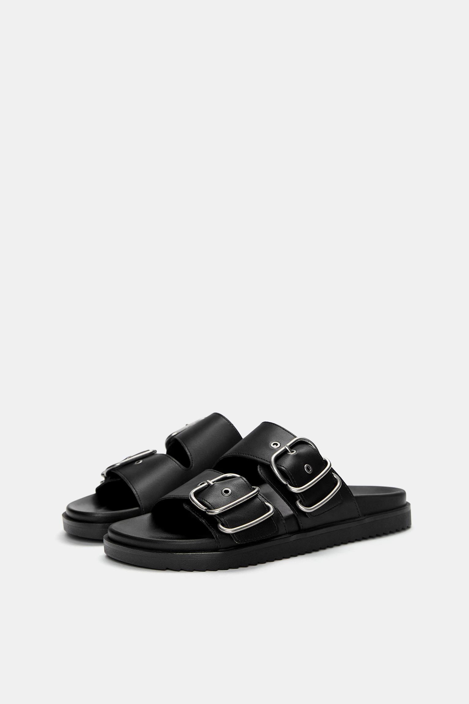 Flat sandals with buckles Product Image