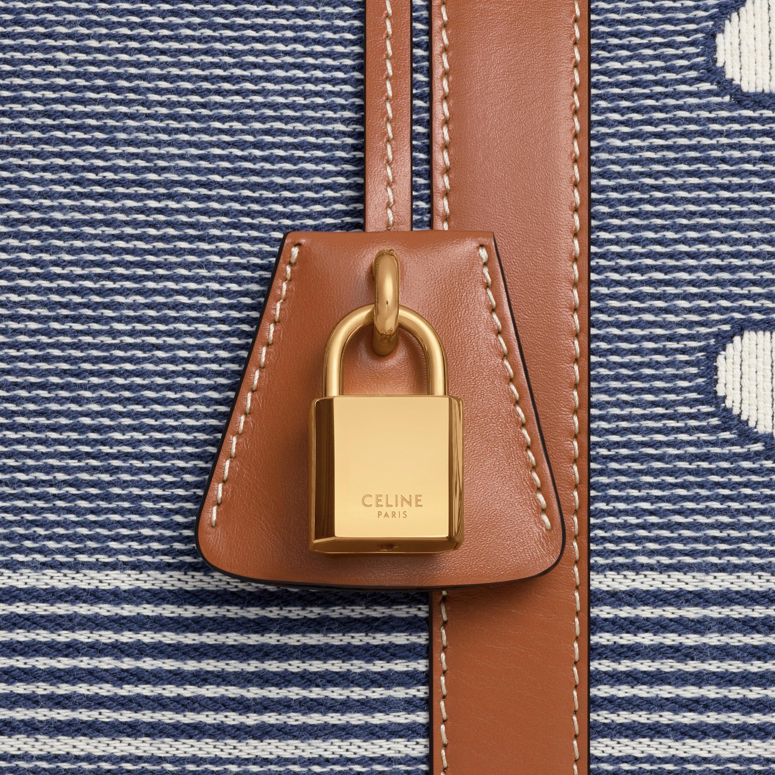 LARGE TRAVEL BAG IN JACQUARD TEXTILE AND CALFSKIN Product Image