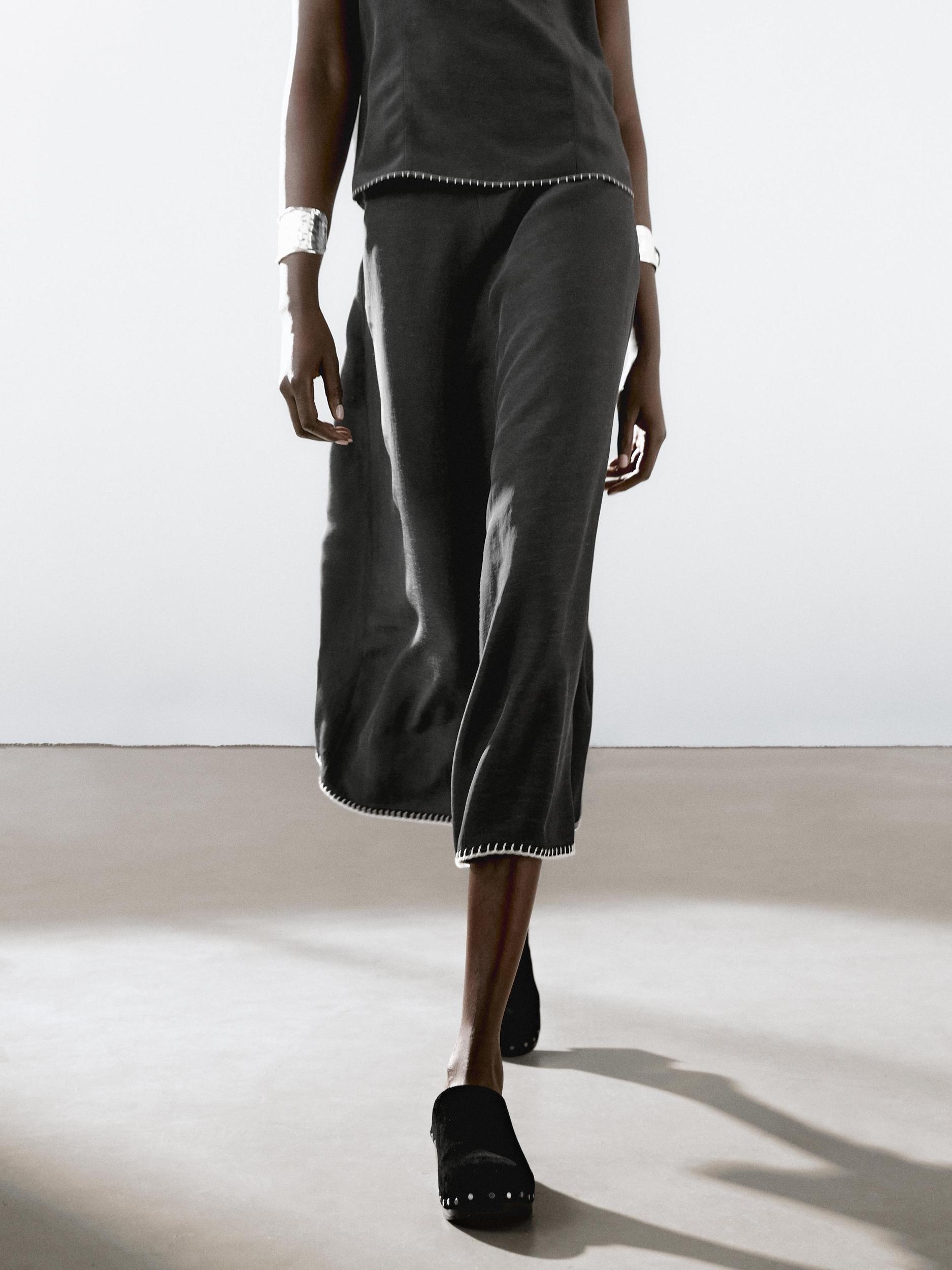 Midi skirt with topstitching detail on the hem Product Image