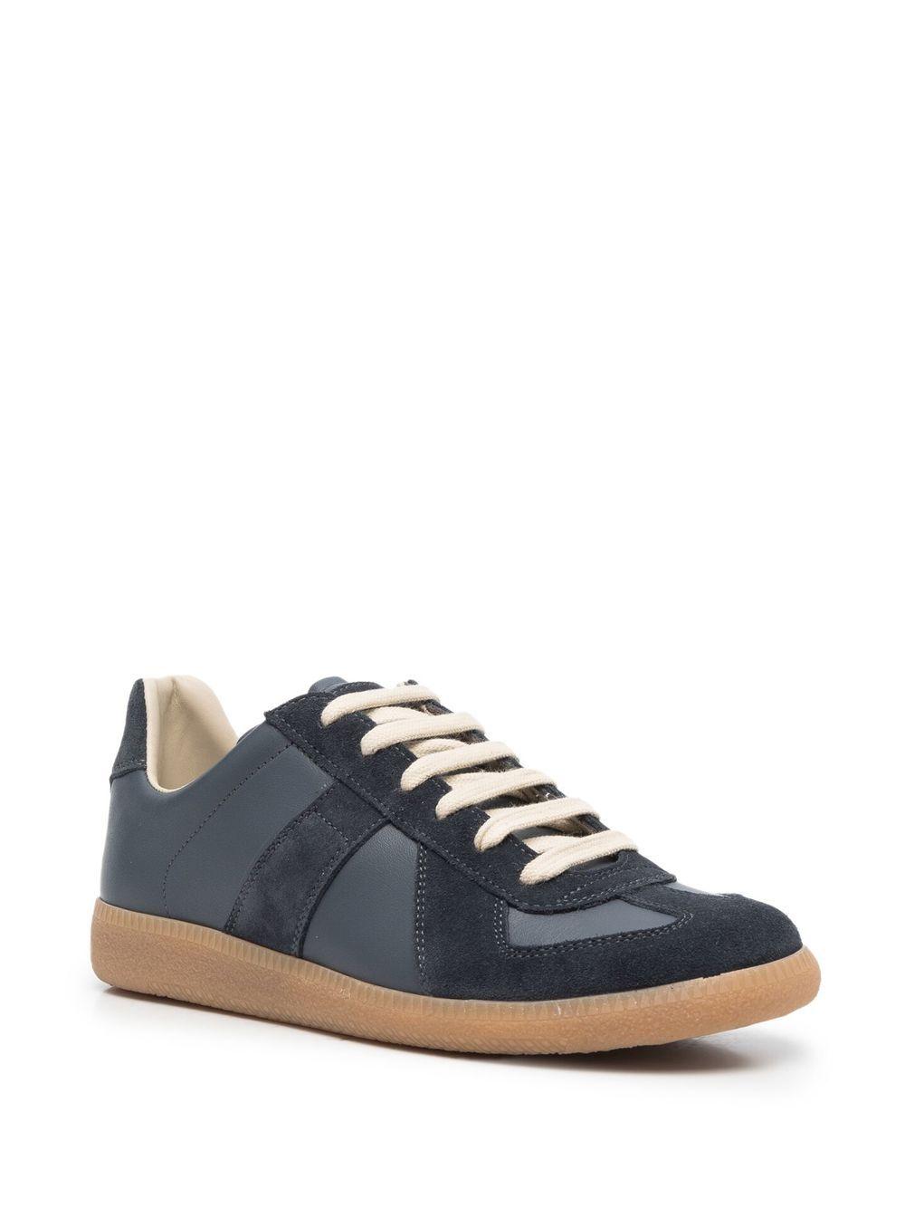 Replica low-top leather sneakers Product Image