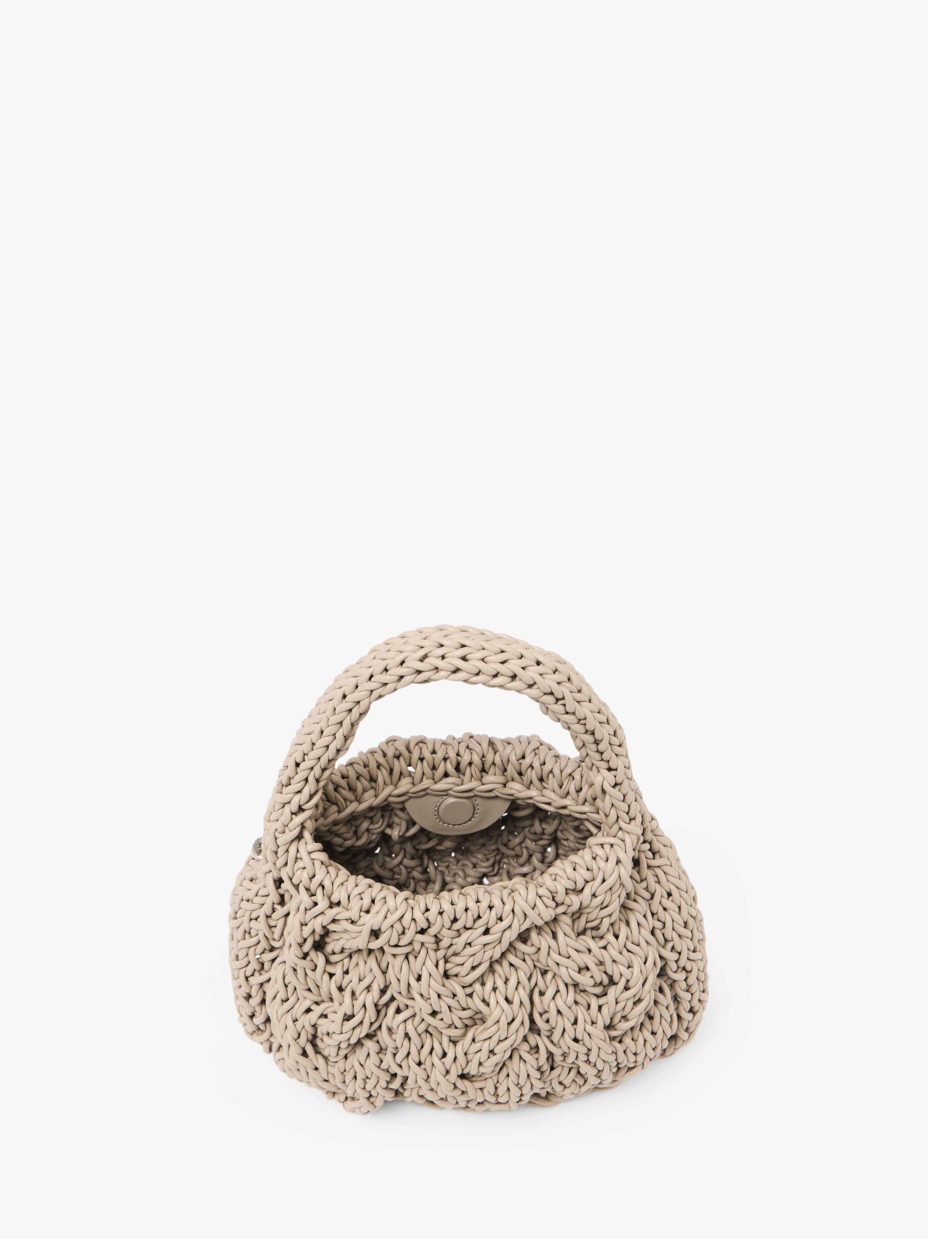 SMALL CABLE KNIT BAG - LEATHER DRAWCORD TOP HANDLE BAG Product Image
