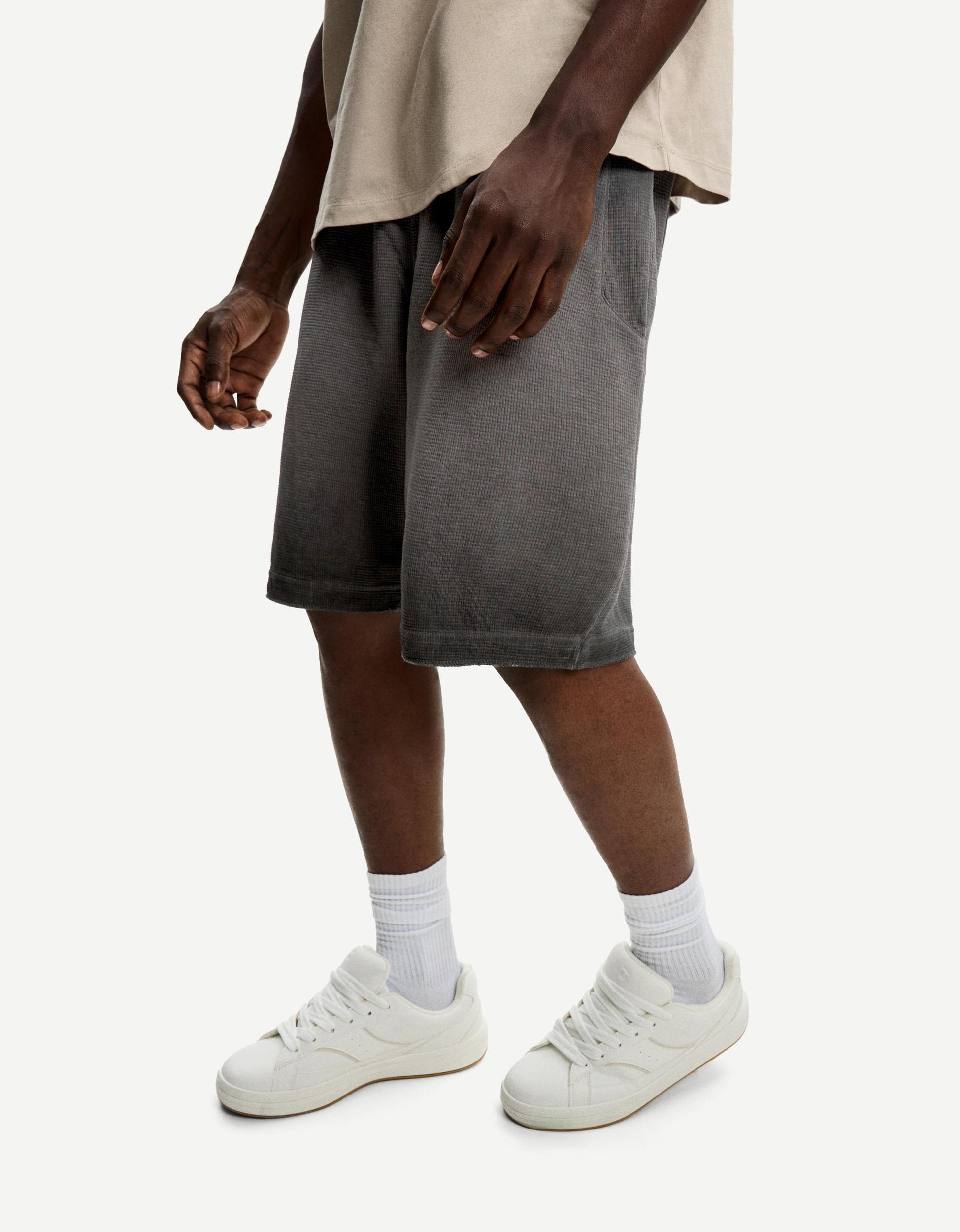 Faded waffle-knit Bermuda shorts Product Image