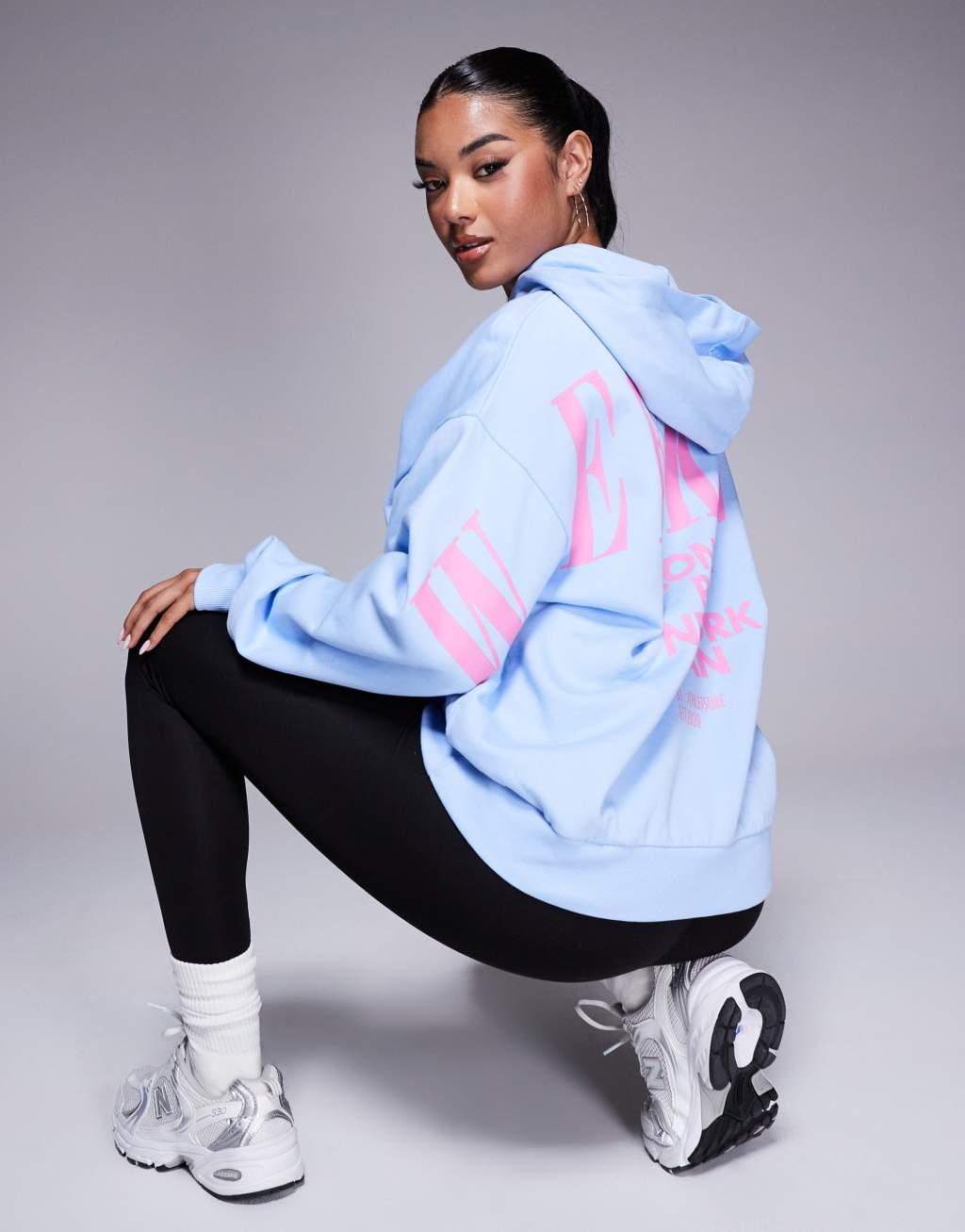 Weekend Collective oversized hoodie with pink stacked back logo in blue Product Image