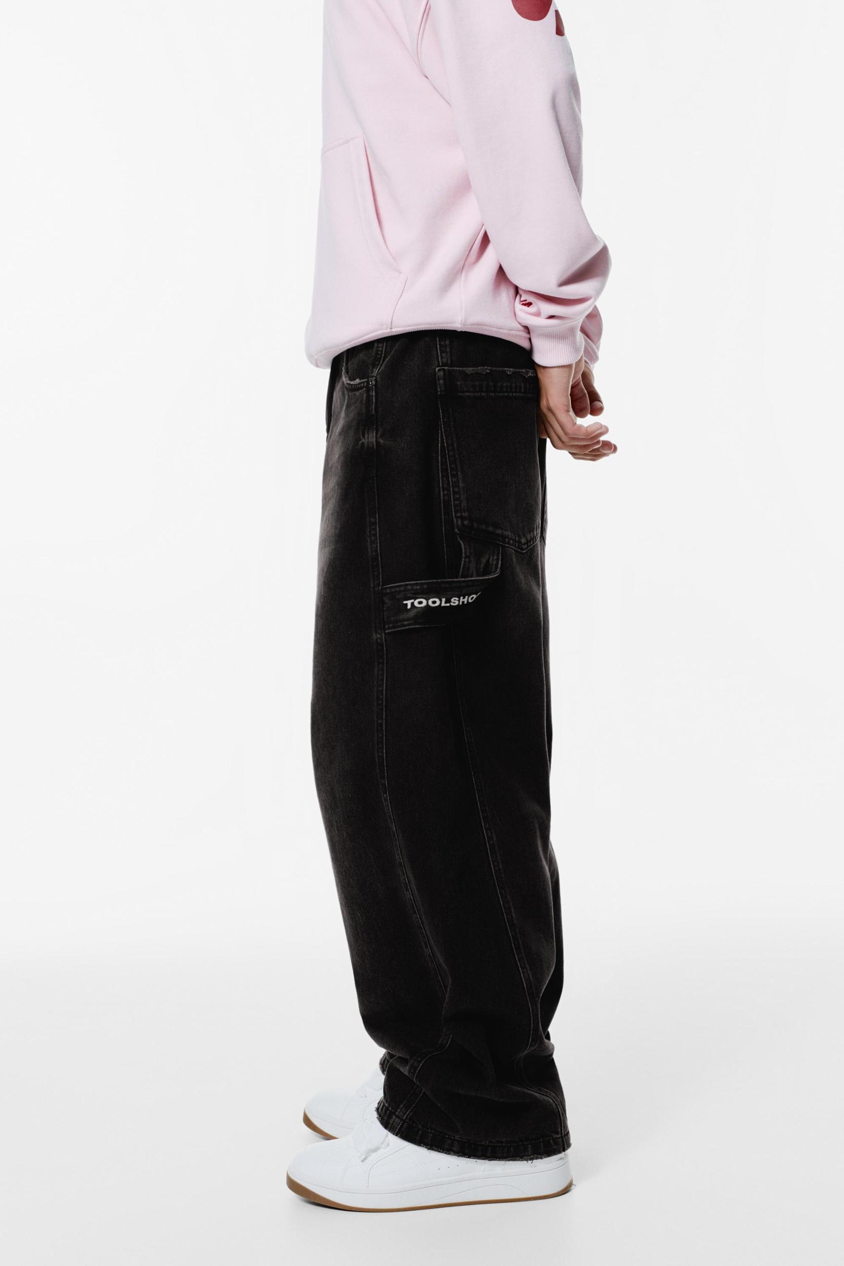 Balloon fit jeans with embroidered pocket Product Image