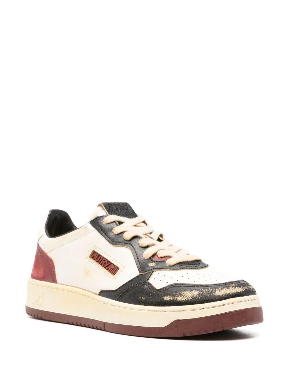 Action leather sneakers Product Image