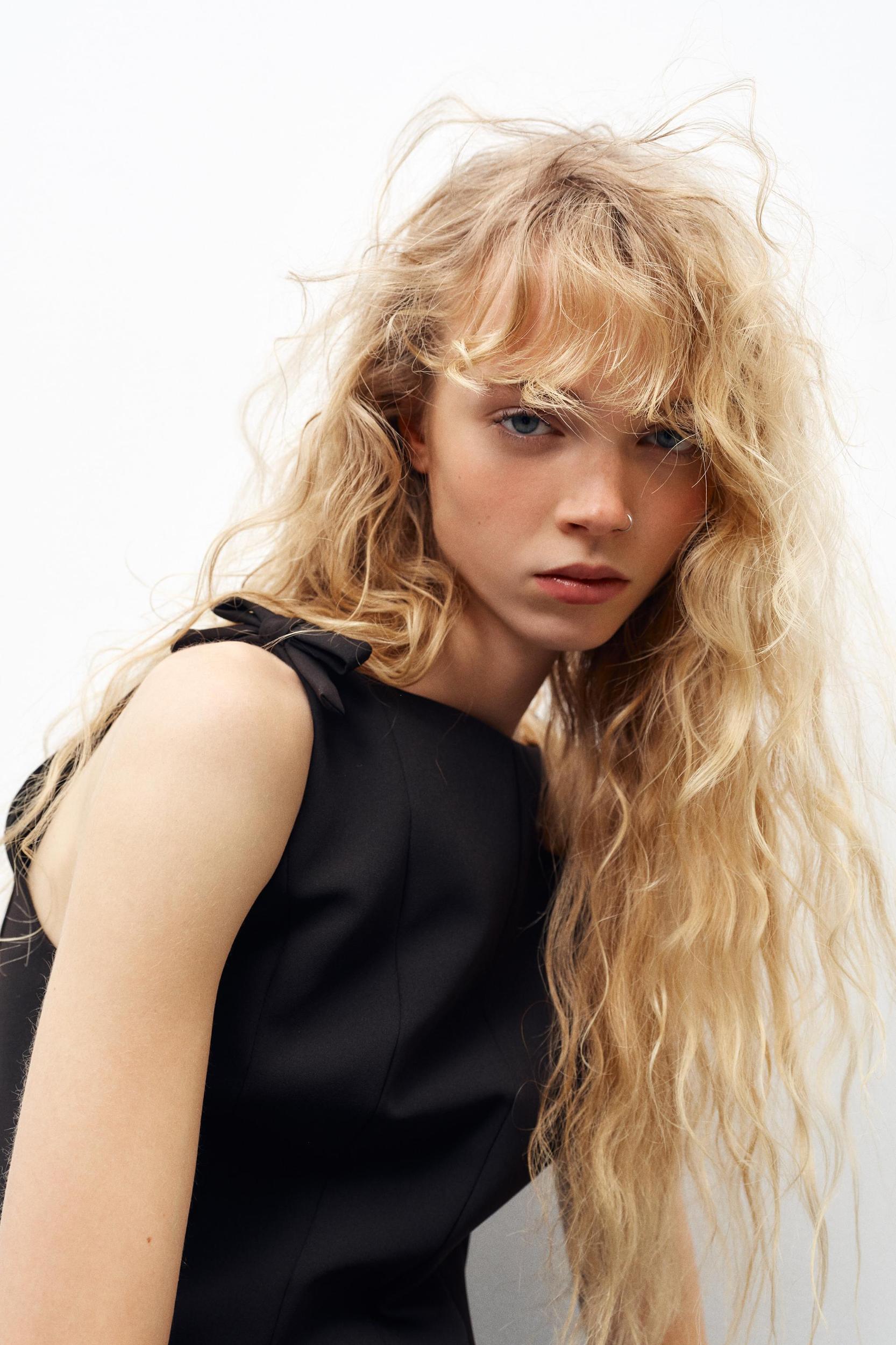 PEPLUM BOWS TOP Product Image