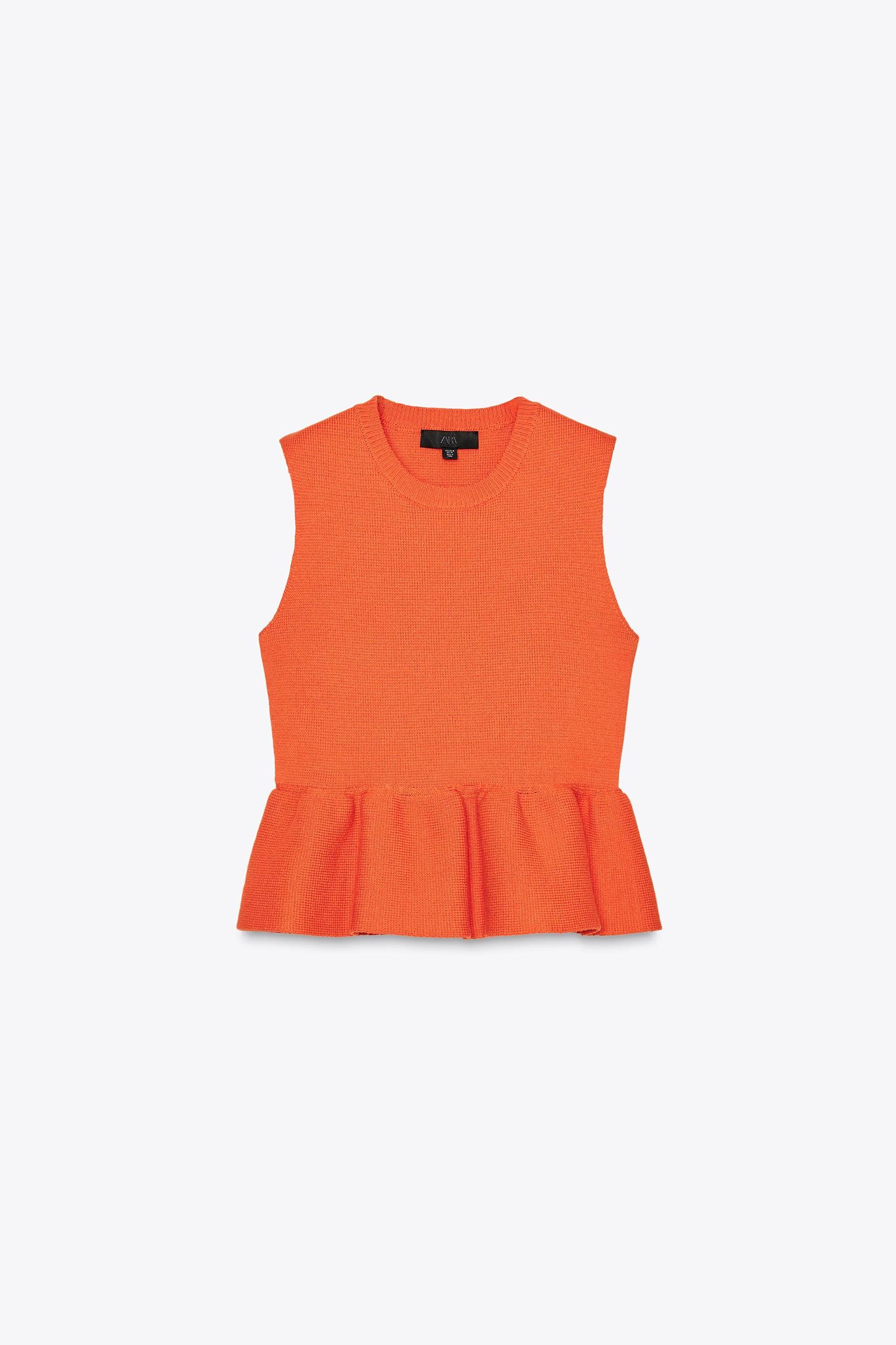 KNIT PEPLUM TOP Product Image