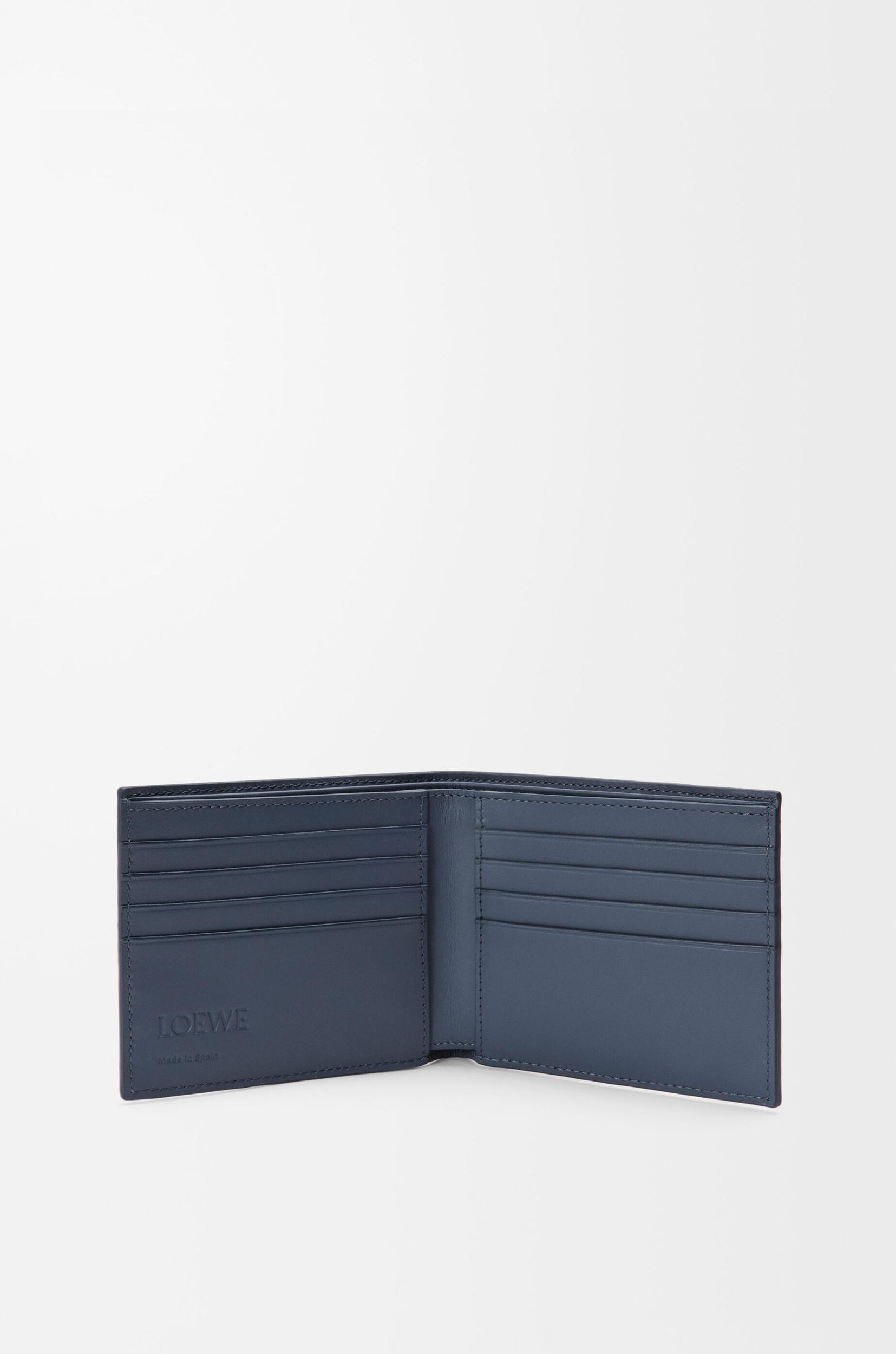 Puzzle bifold wallet in classic calfskin Product Image