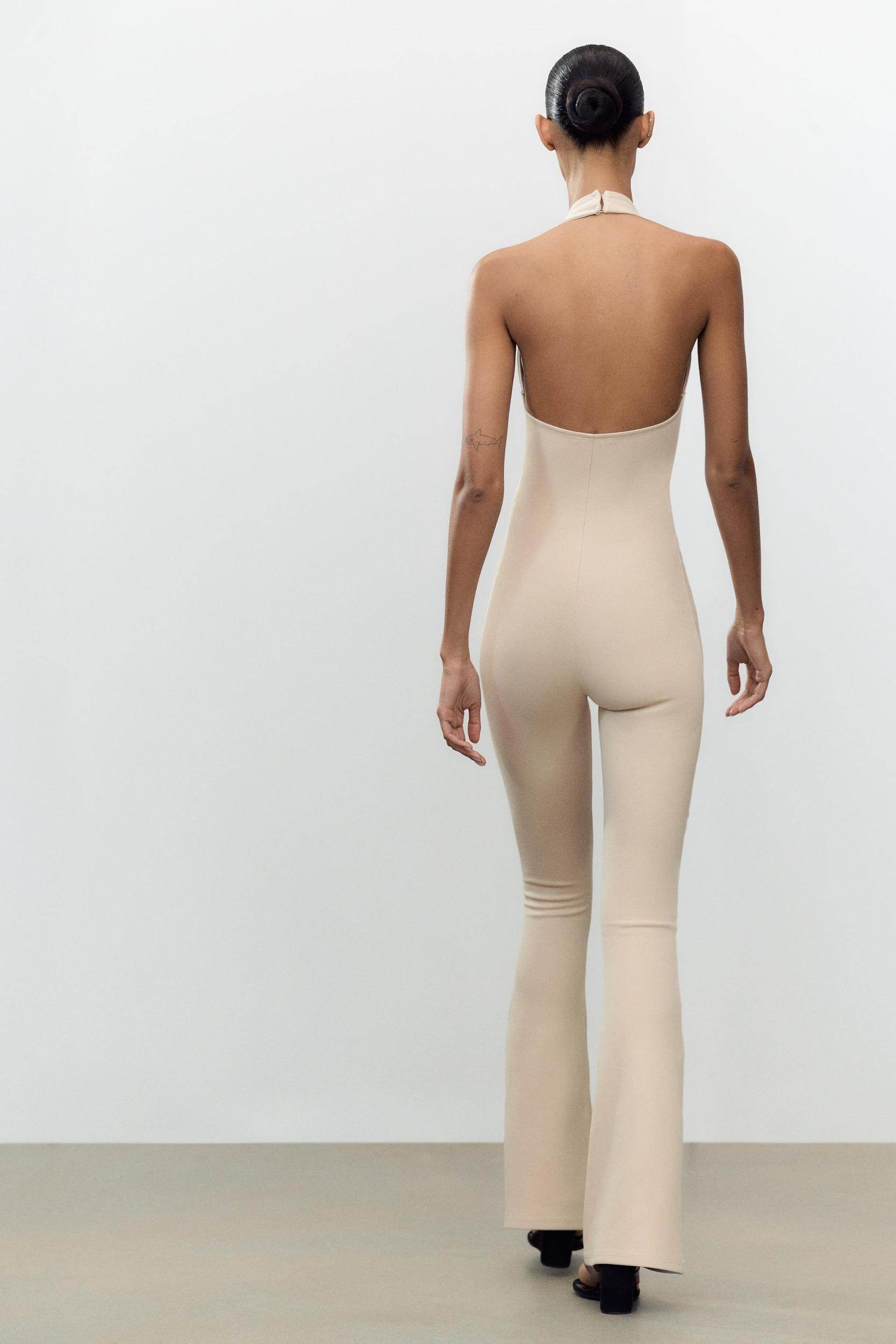 LONG HALTER INTERLOCK JUMPSUIT Product Image