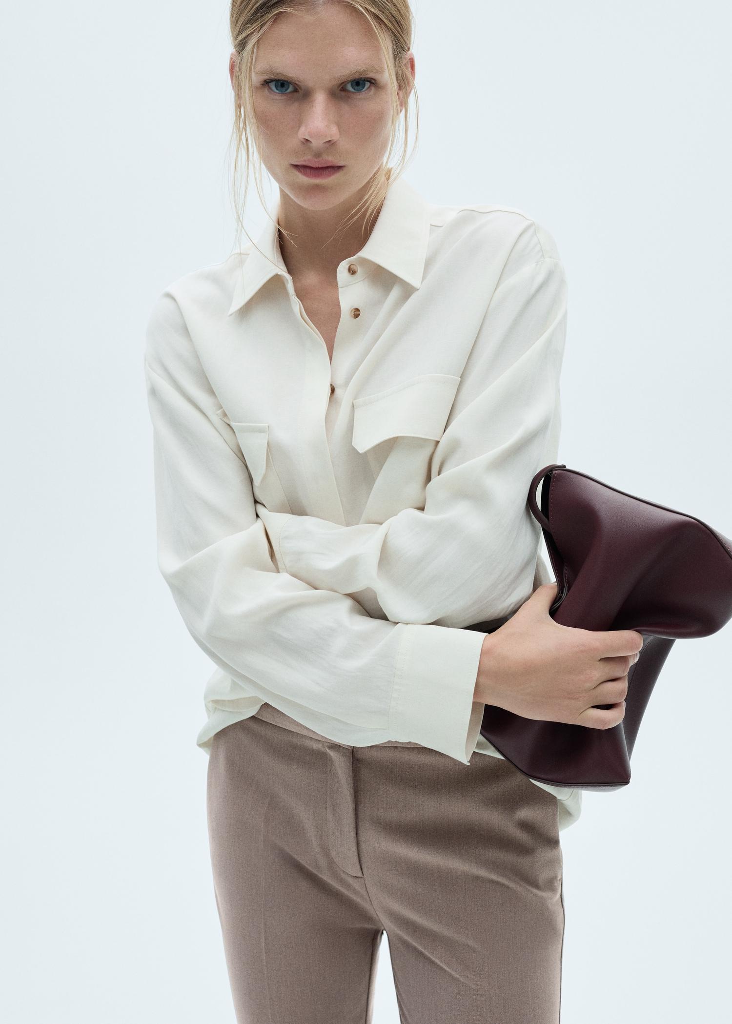 Flared flowing pants - Women | MANGO USA Product Image