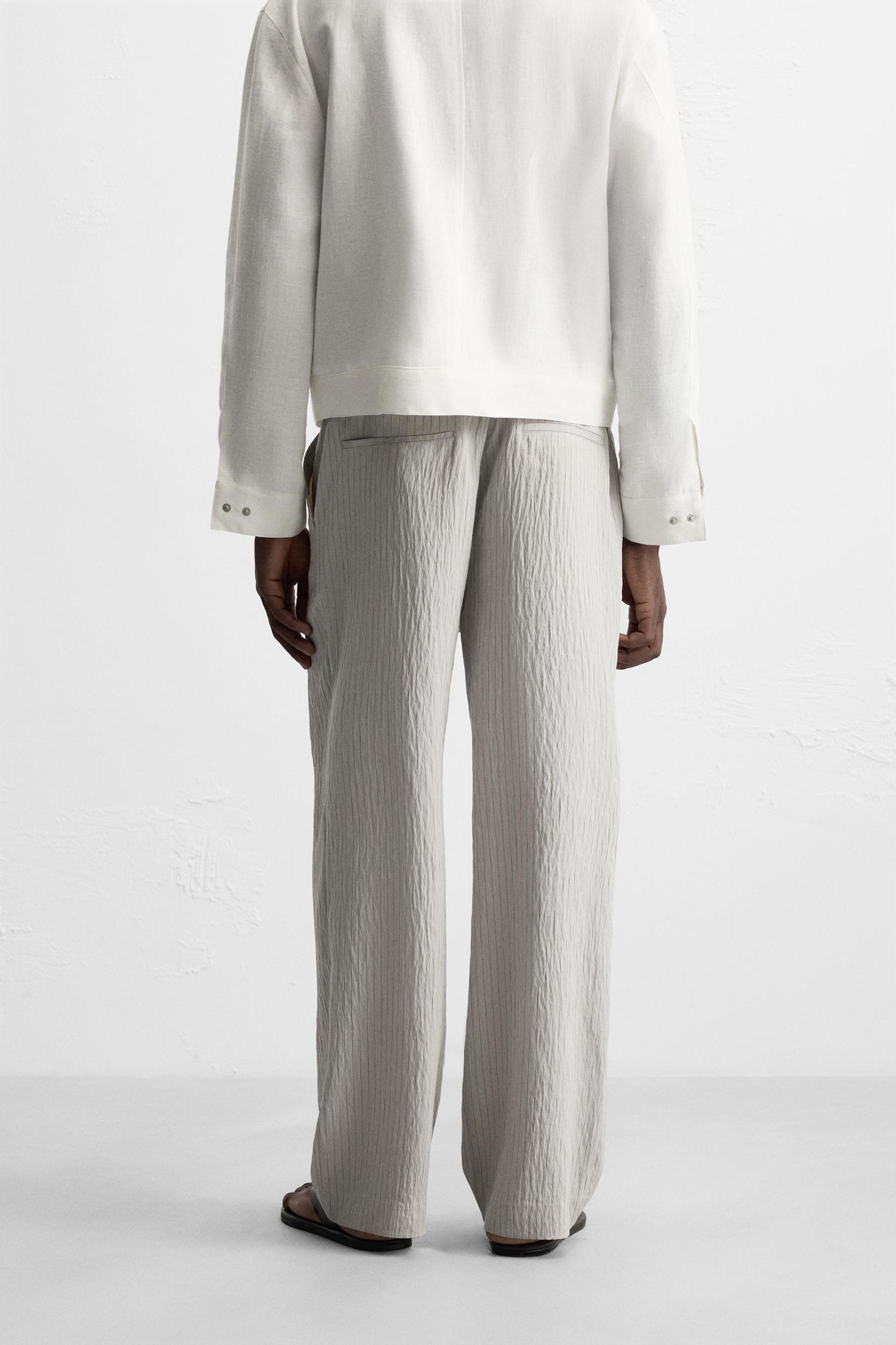 STRIPED FLOWY PANTS Product Image