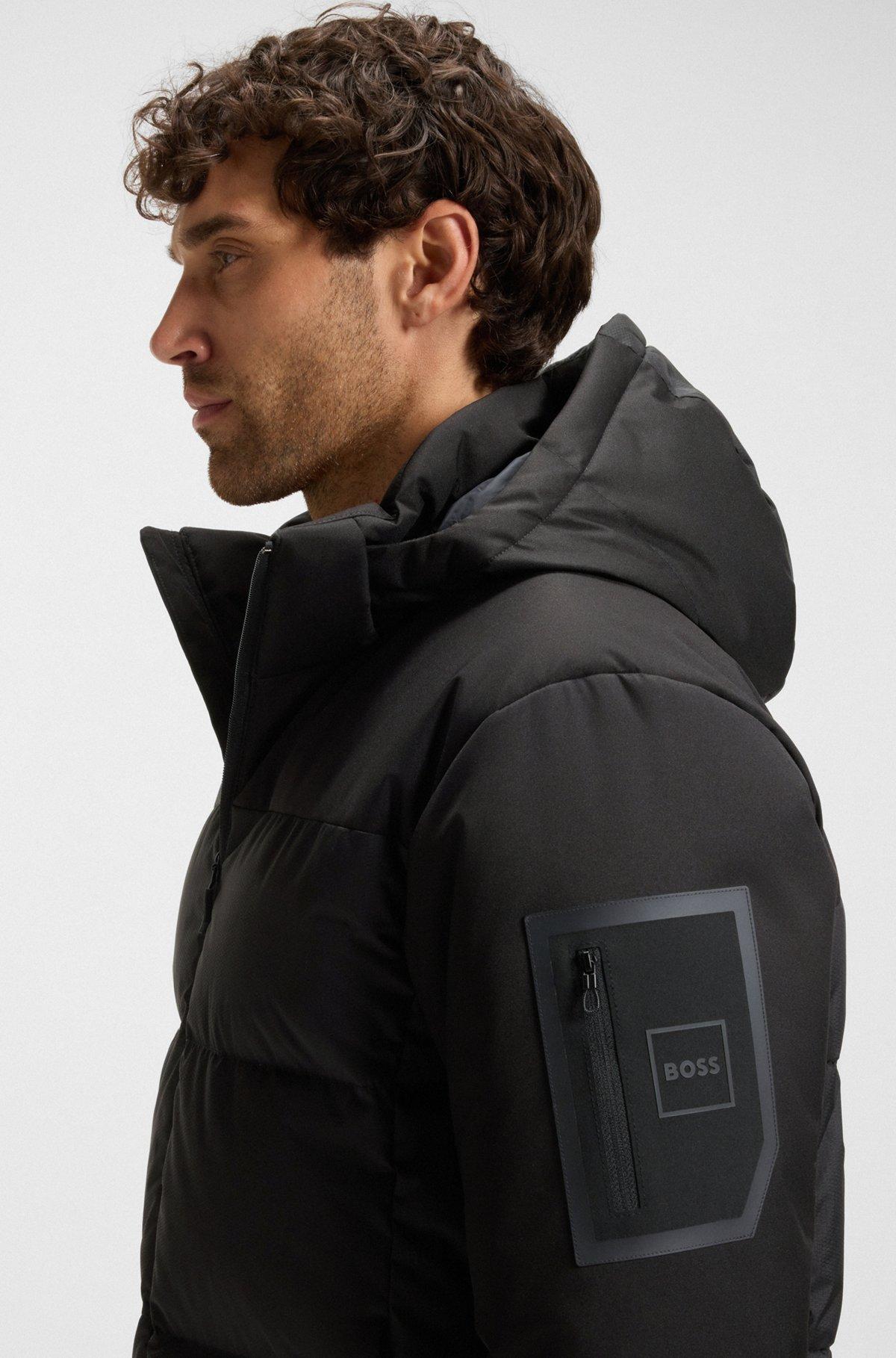 Water-repellent down jacket with detachable hood and sleeves Product Image