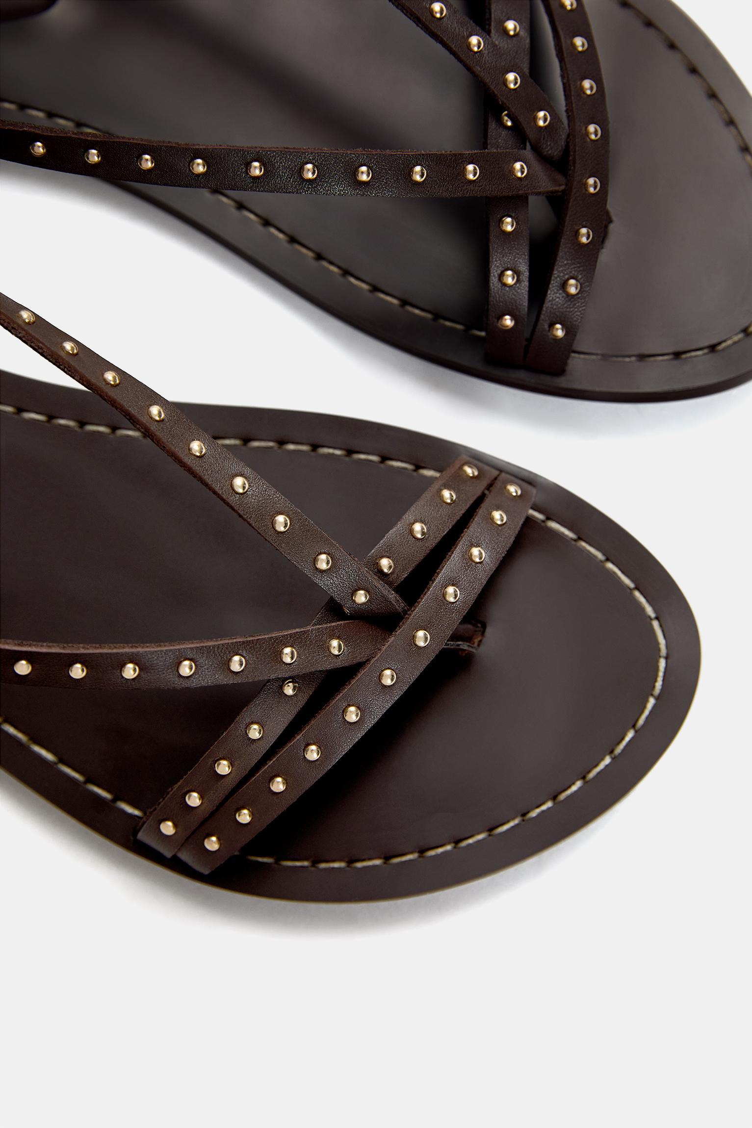 Studded leather flat sandals Product Image