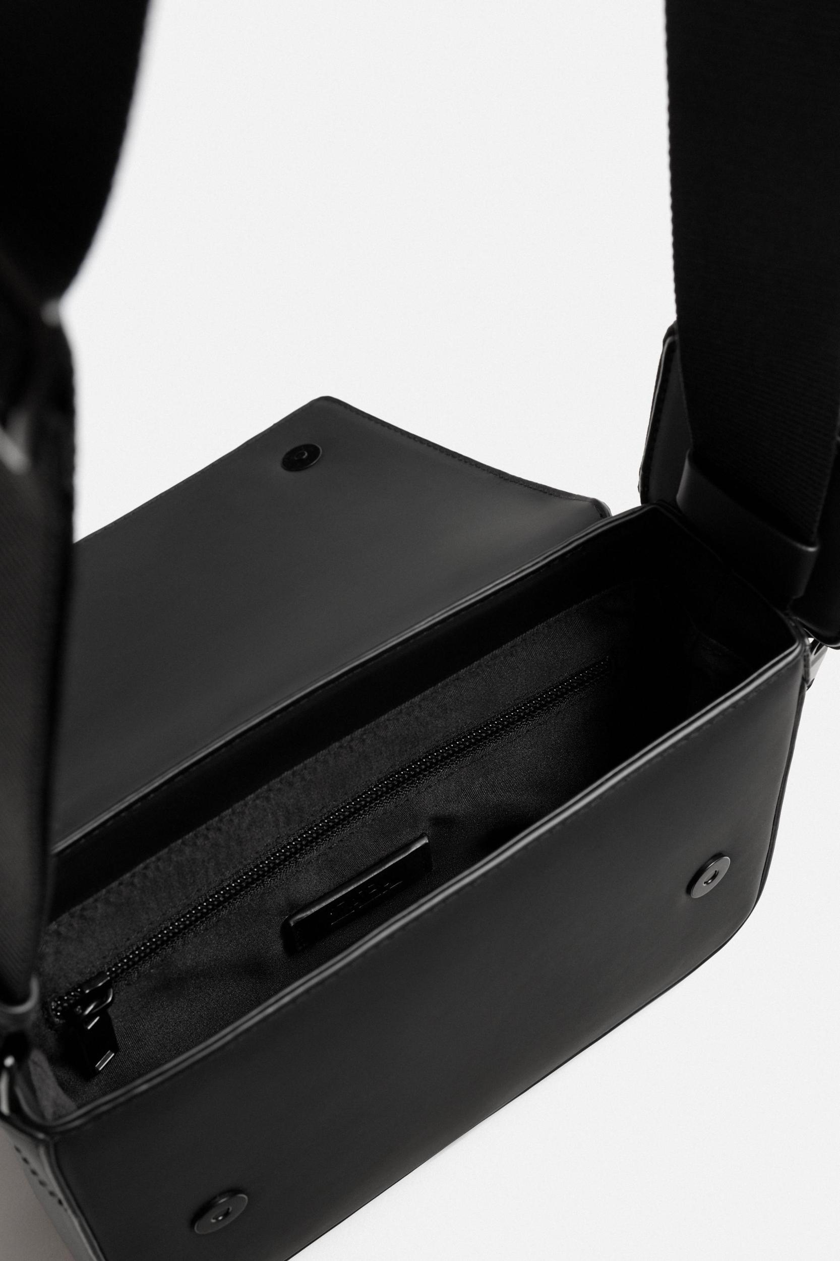 TEXTURED RUBBERIZED CROSSBODY BAG Product Image