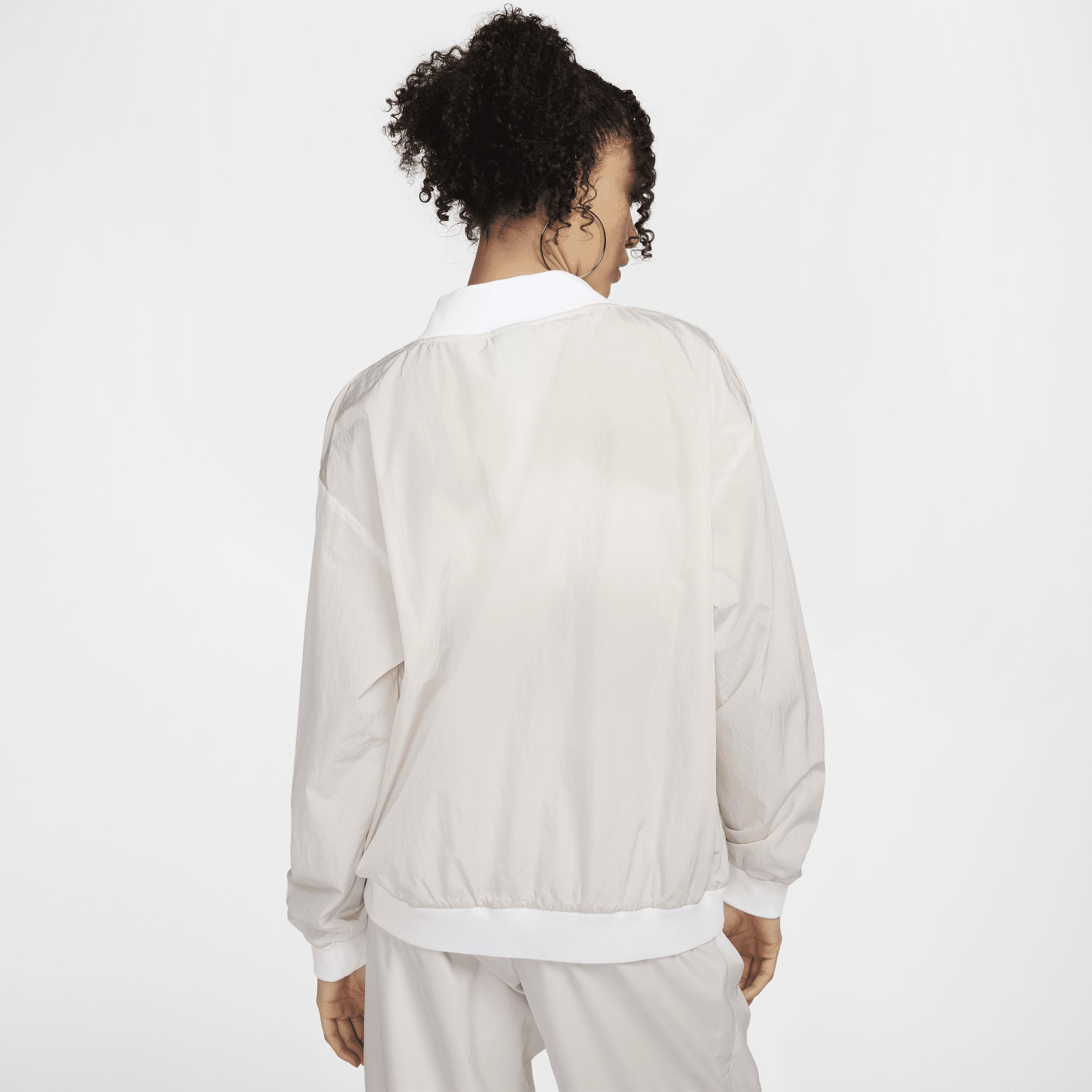 Womens Nike Sportswear Essential Loose UV Woven Long-Sleeve V-Neck Top | FV7649-110 Product Image