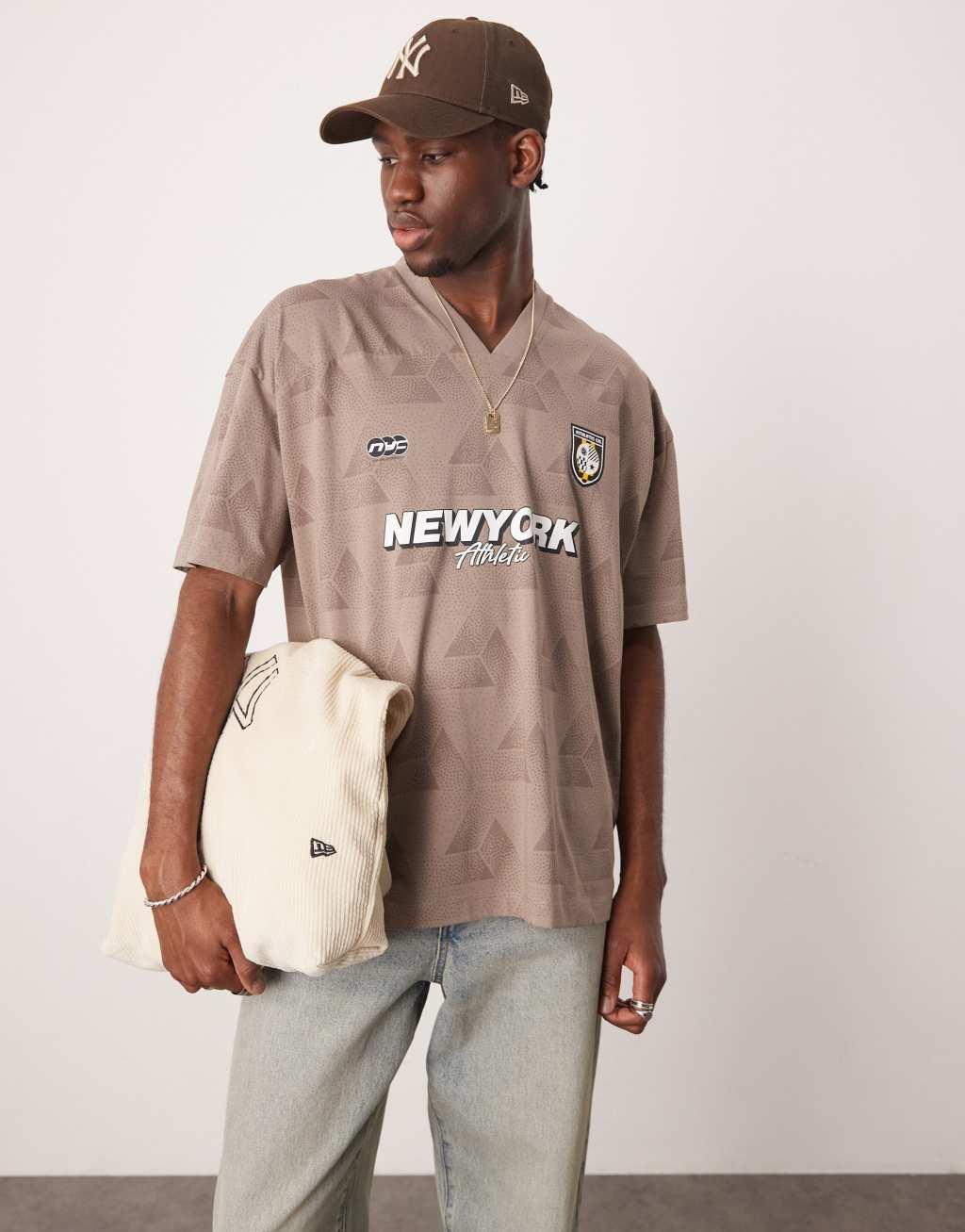 ASOS DESIGN oversized v-neck T-shirt with sports graphic in stone Product Image