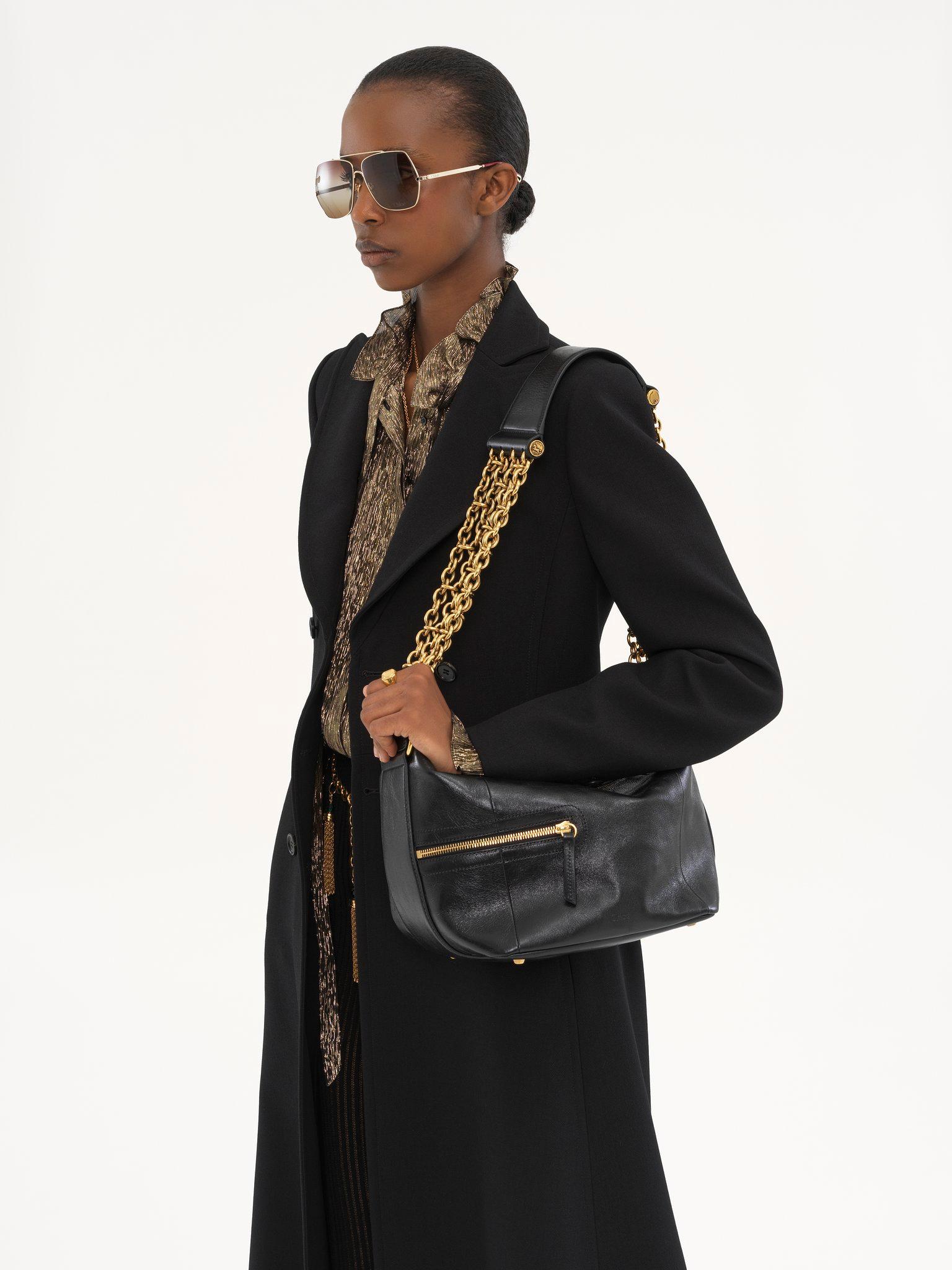 Camera Chain bag in shiny leather Product Image