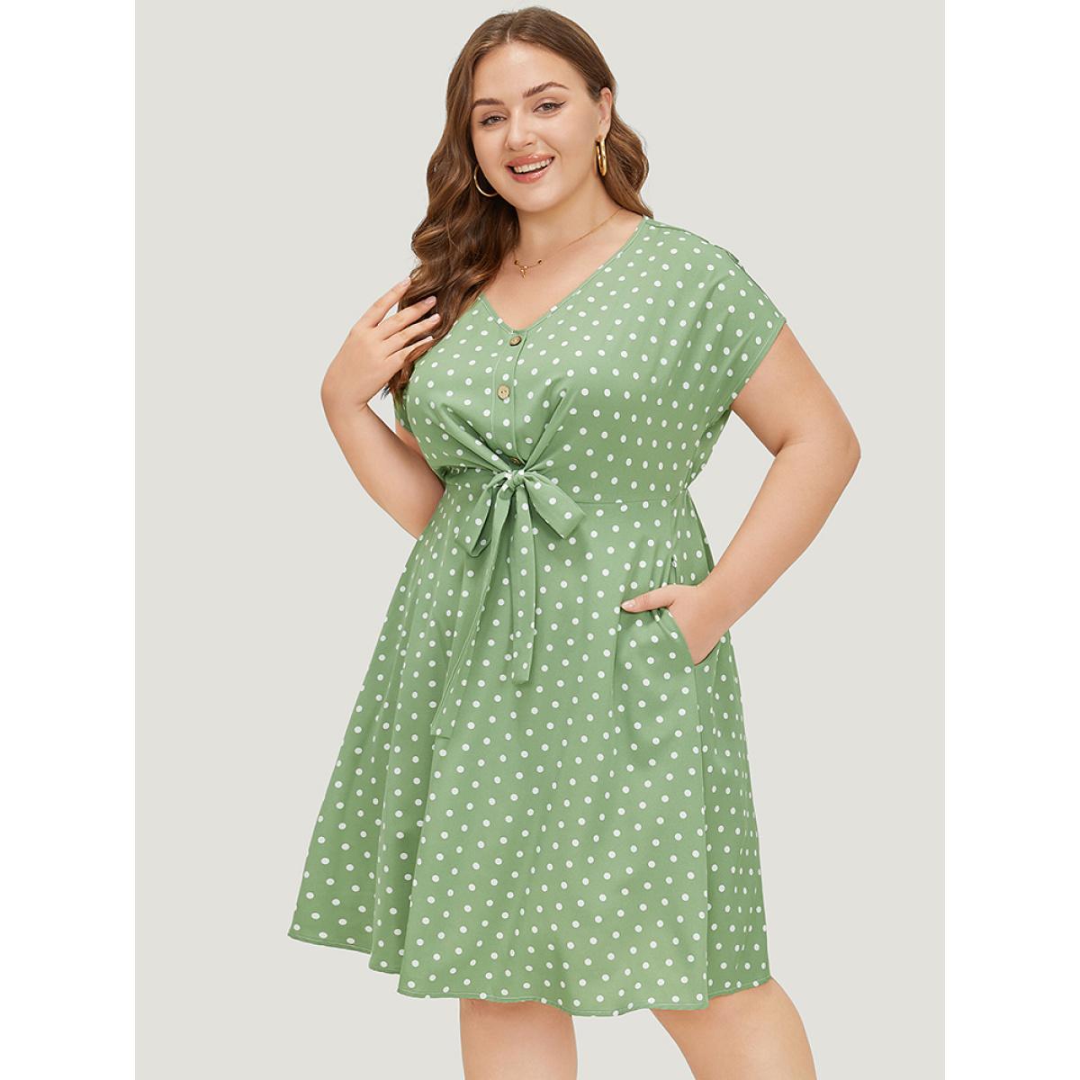 Plus Size Polka Dot Pocket Button Detail Twist Front Knee Dress Green Women Elegant Knotted V-neck Cap Sleeve Curvy Knee Dress BloomChic 14-16/1X Product Image