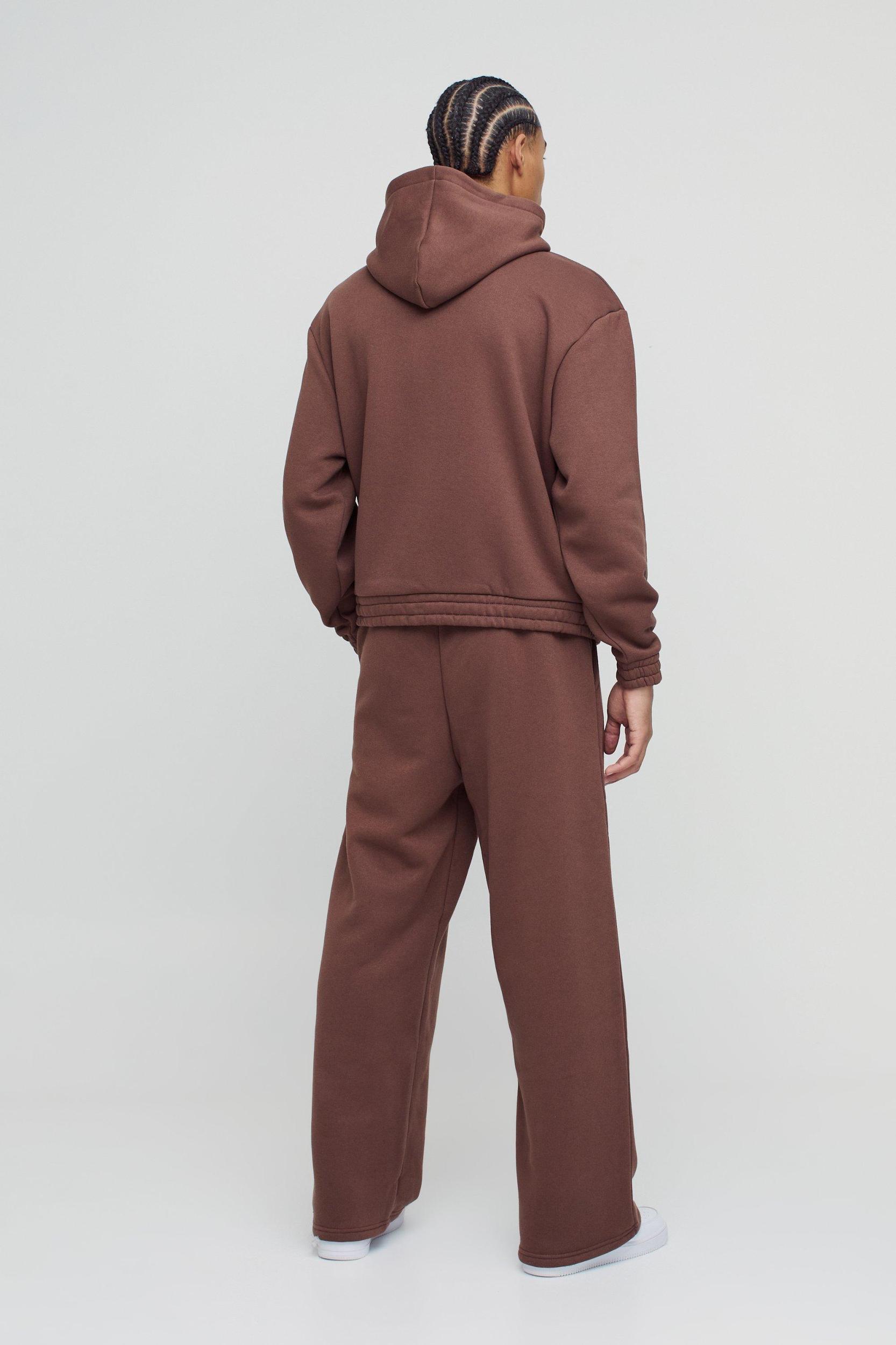 Oversized Boxy Wide Leg Hooded Tracksuit With Rubber Badge | boohooMAN USA Product Image