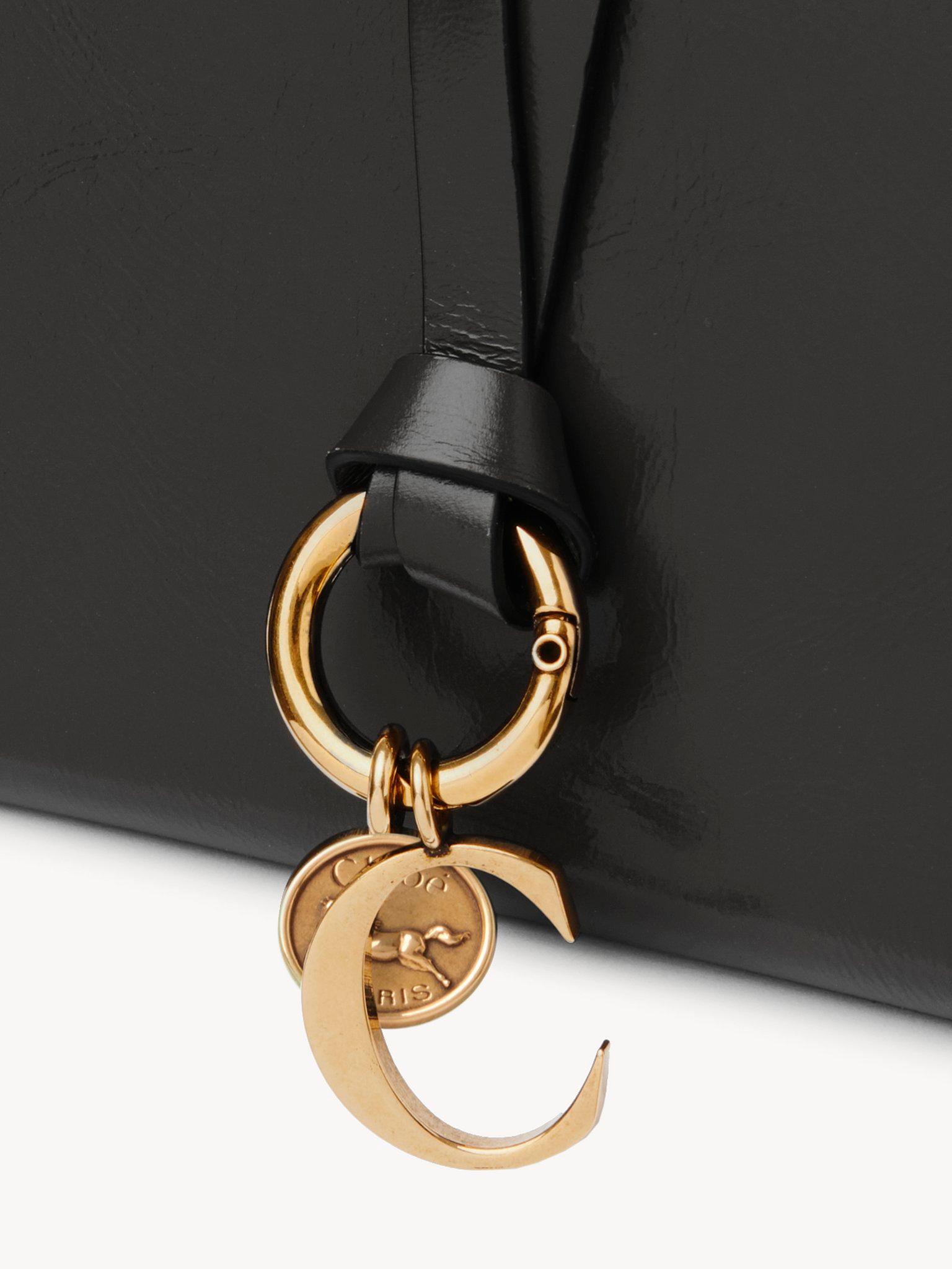 Alphabet bifold wallet in shiny leather Product Image