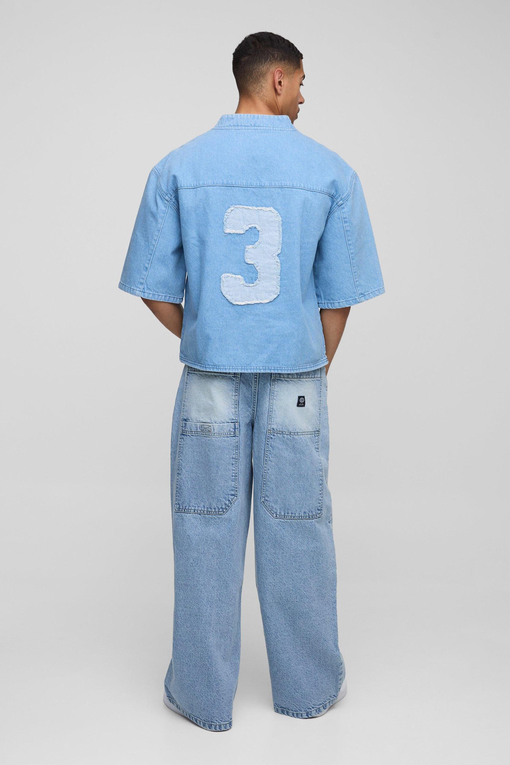 Oversized Boxy Denim V Neck Applique Football Top | boohooMAN USA Product Image