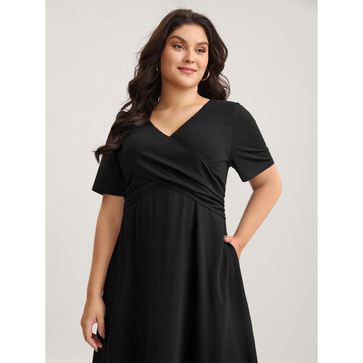 Plus Size Overlap Bodice Solid Knit Pockets Midi Dress Black Women Leisure Overlap Collar Short sleeve Curvy BloomChic 12/L Product Image