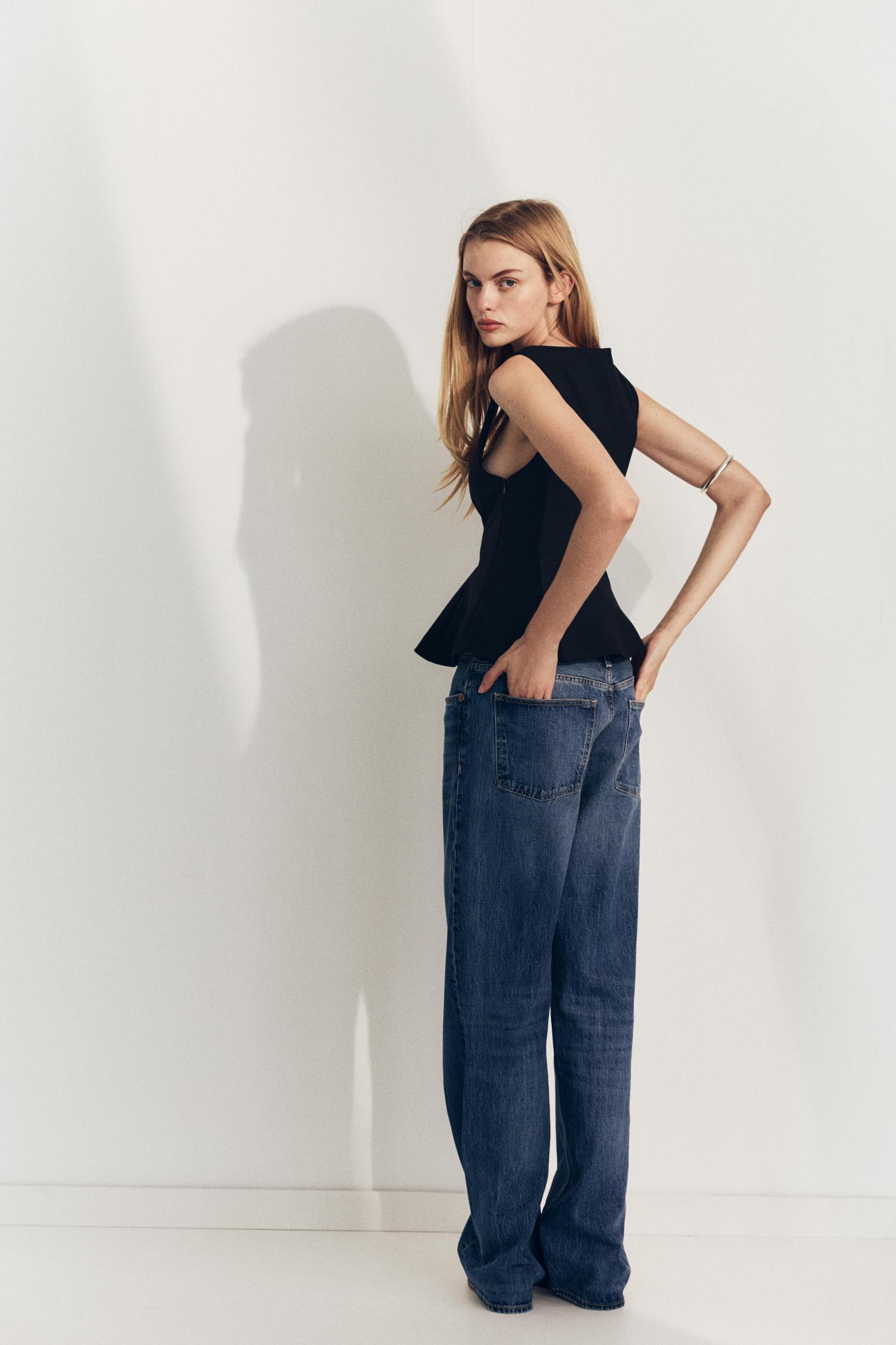 STRETCHY PEPLUM TOP Product Image