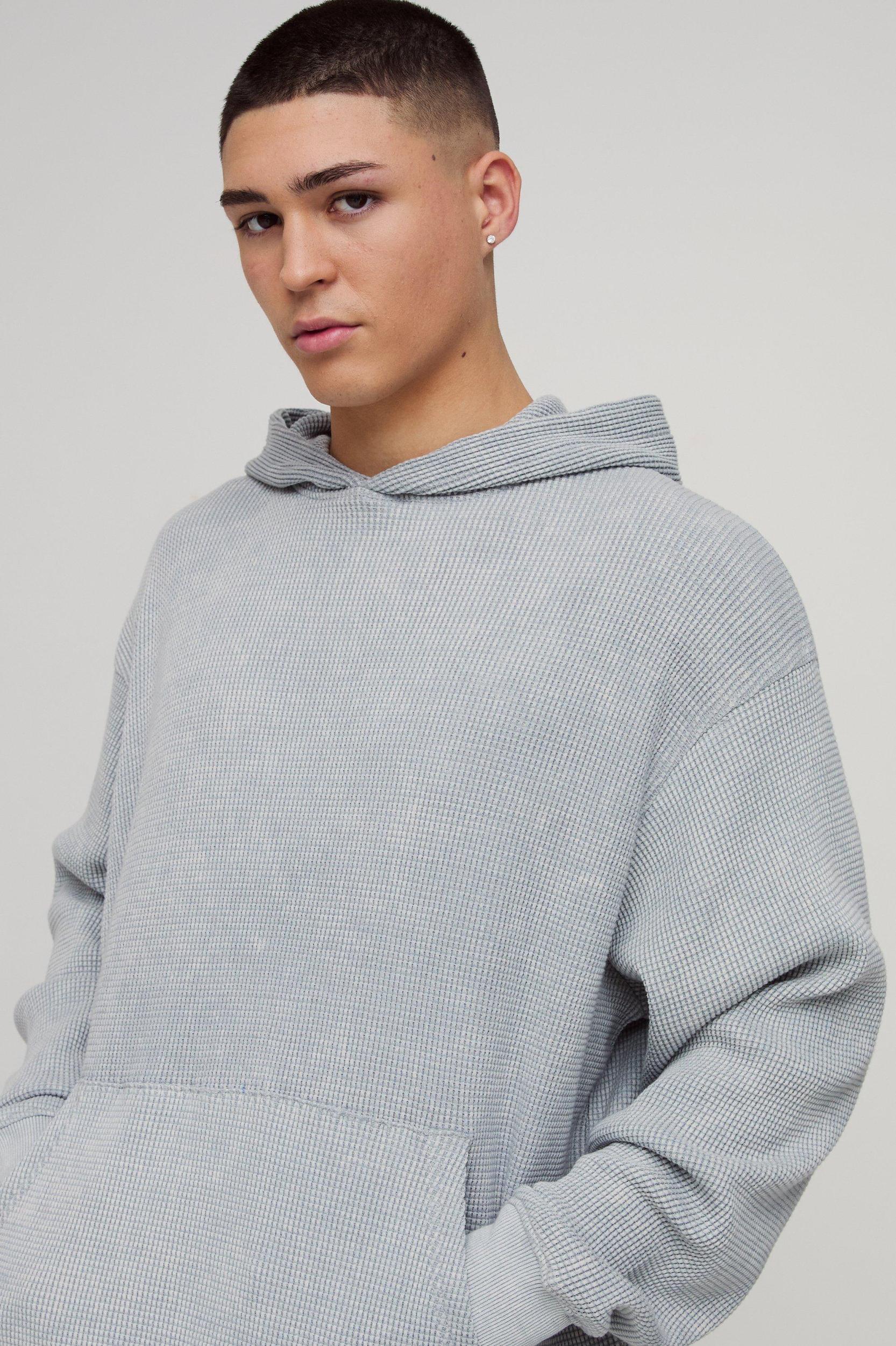 Oversized Acid Wash Heavy Waffle Hoodie with Woven Tab | boohooMAN USA Product Image